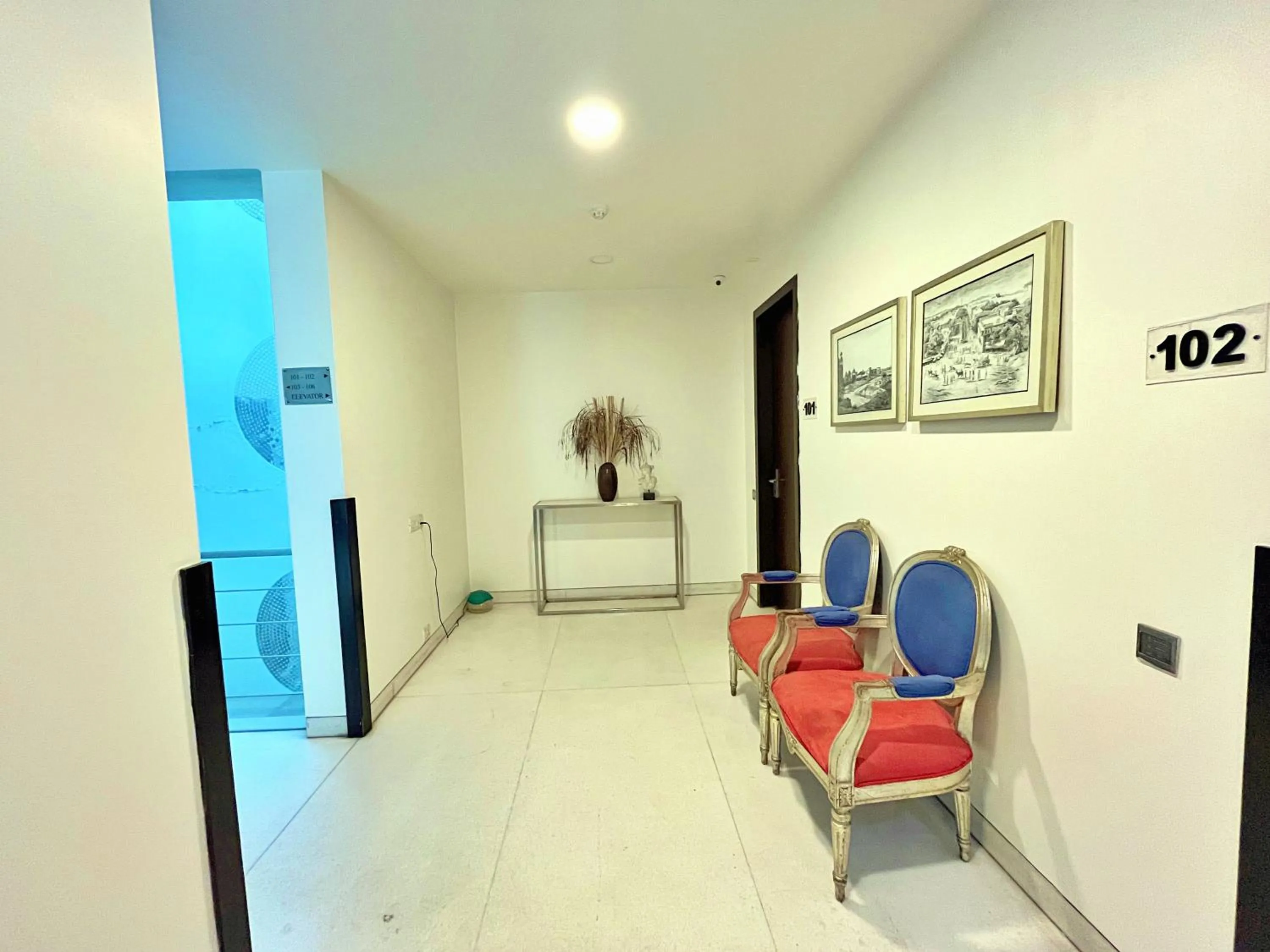 Seating area in Amber Inn by Orion Hotels