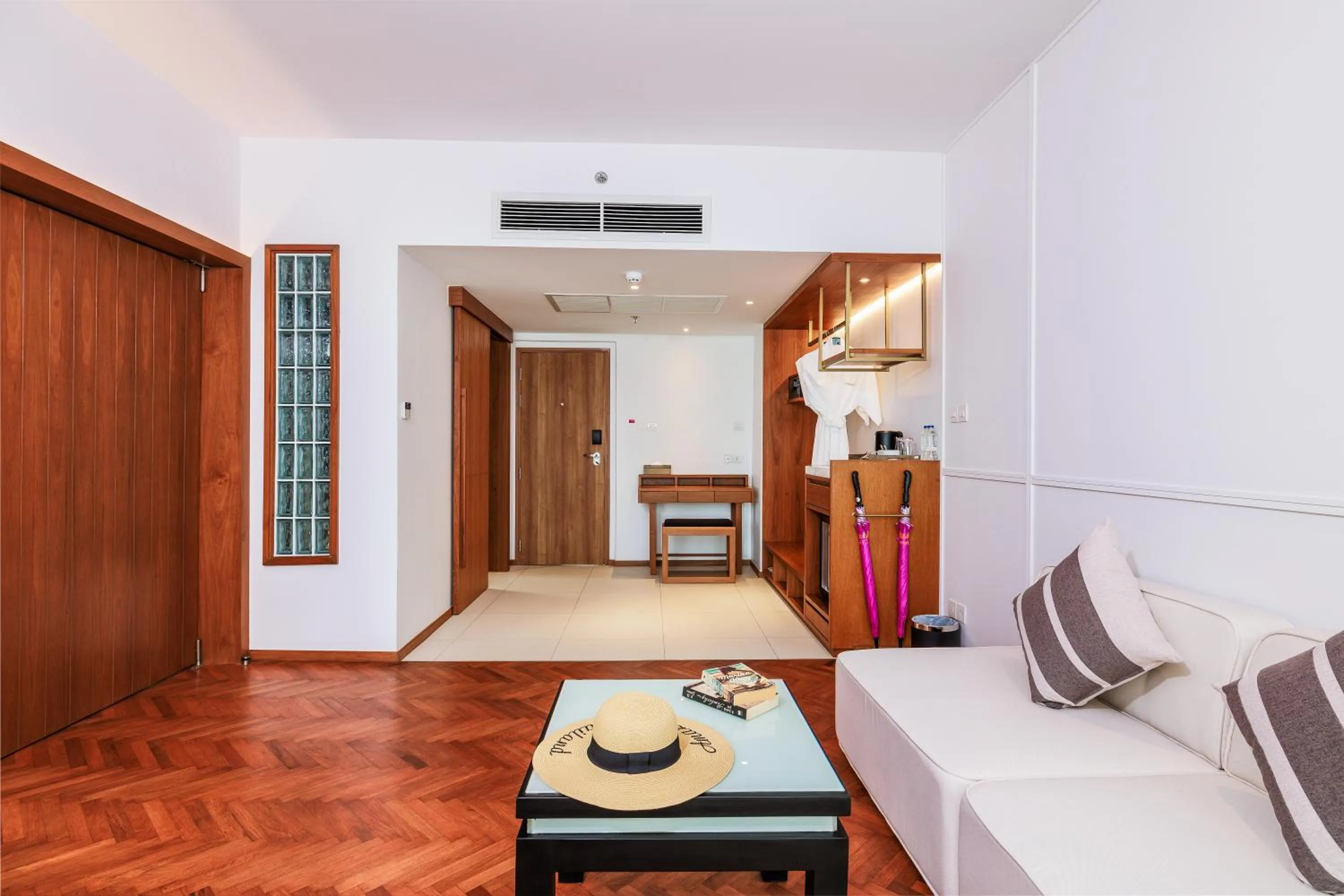 Living room in Patong Beach Hotel by See2Sea