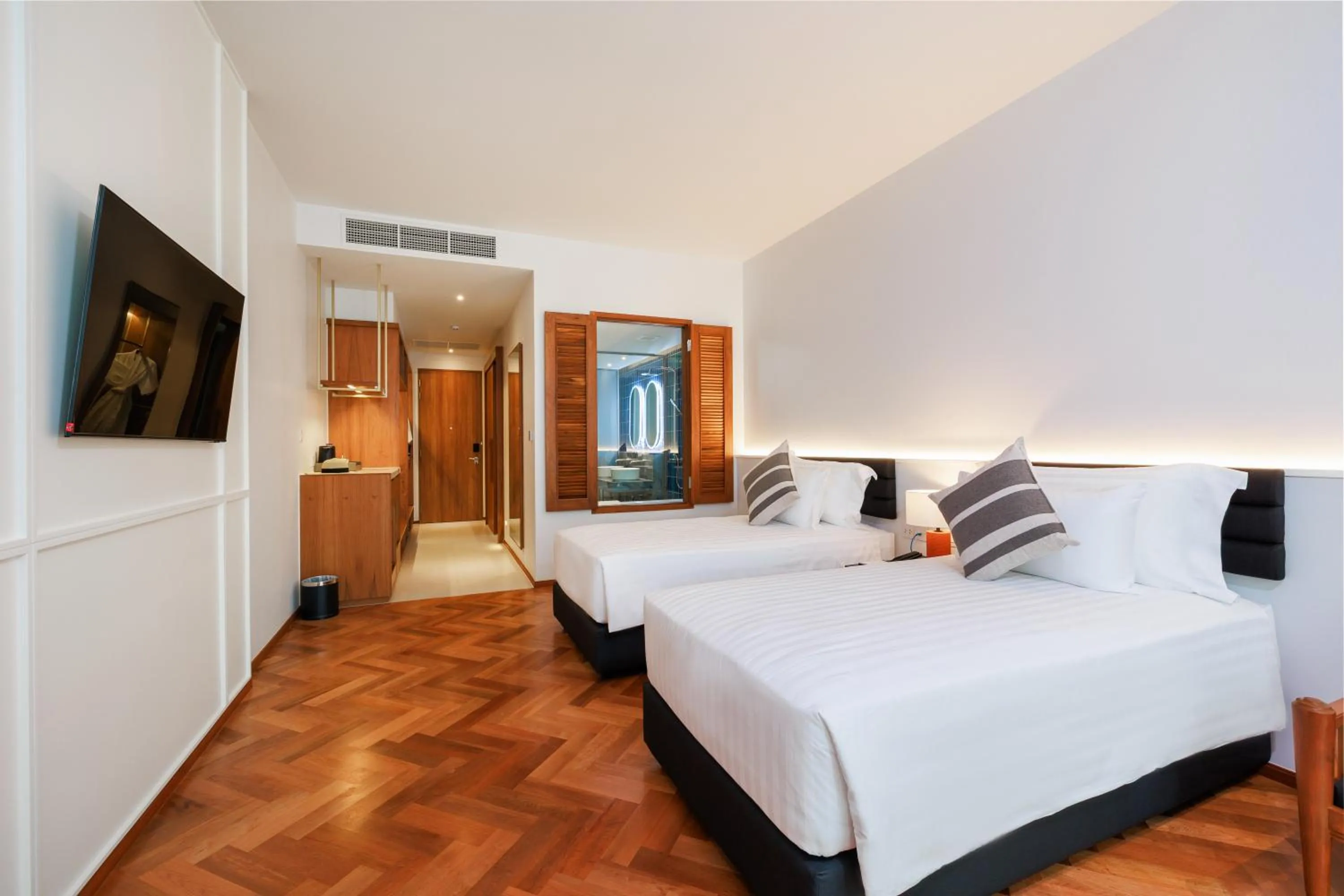 Bed in Patong Beach Hotel by See2Sea