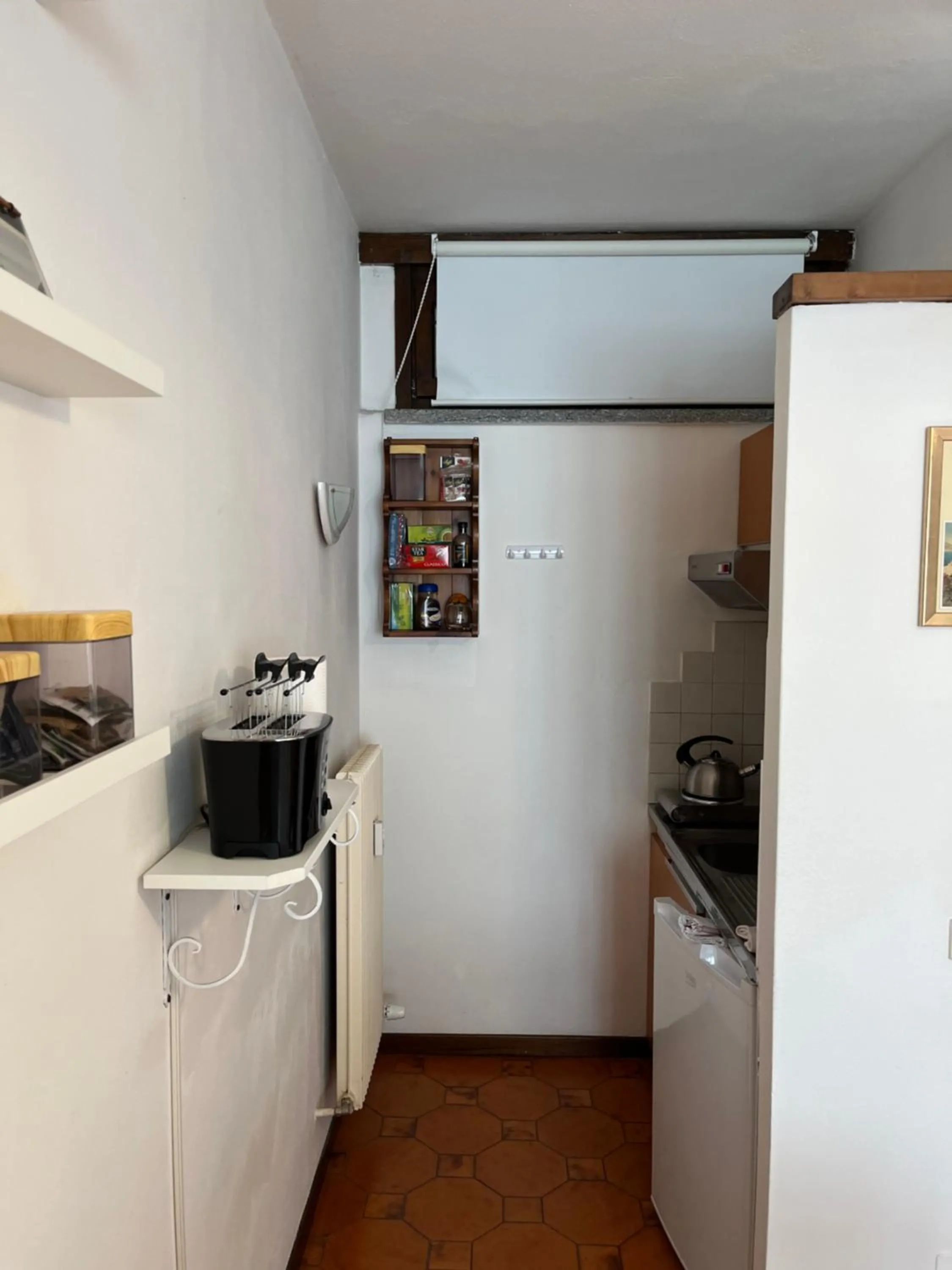 Kitchen or kitchenette in Casa Ambra Comfort Studio