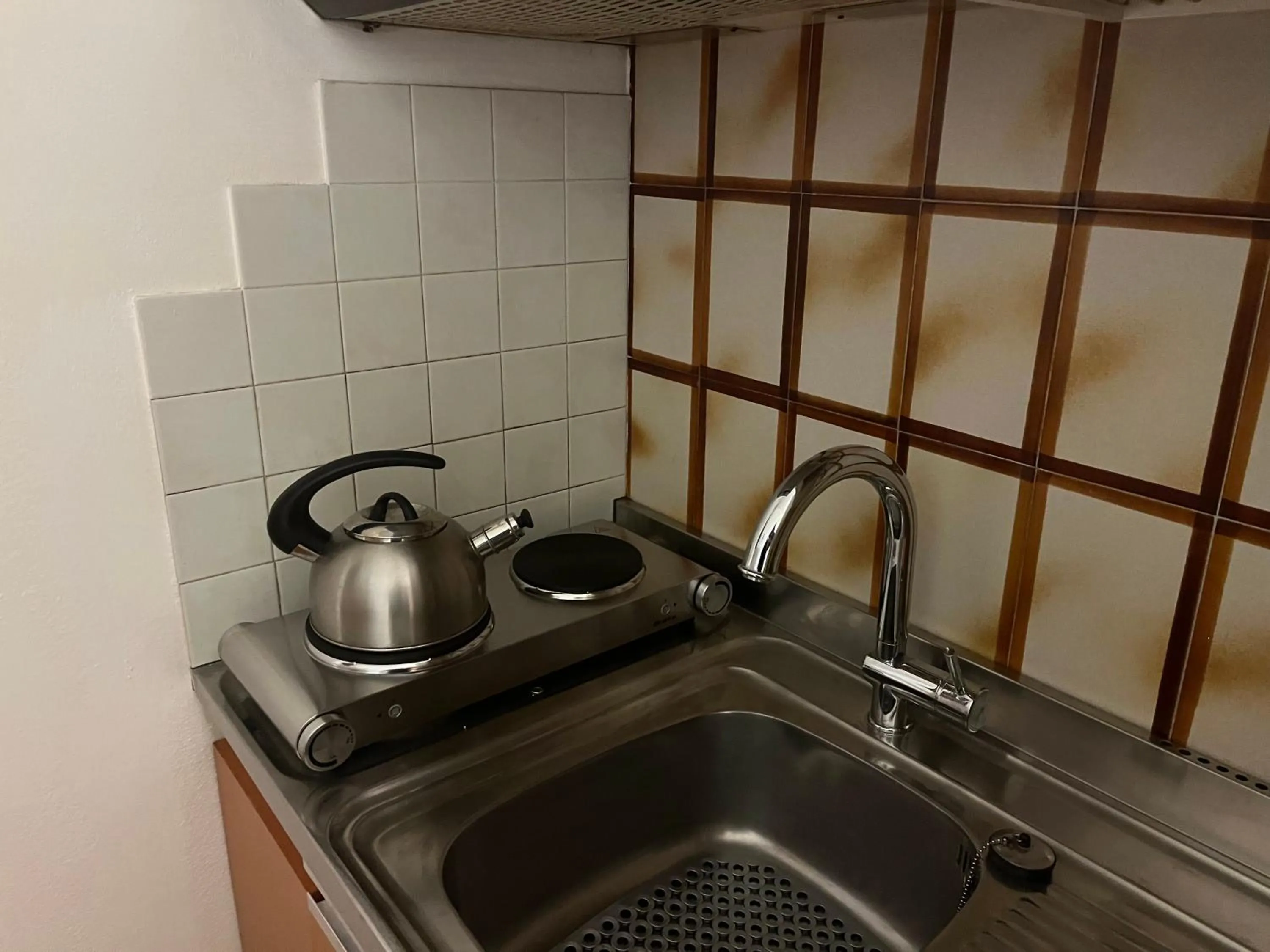Kitchen or kitchenette in Casa Ambra Comfort Studio
