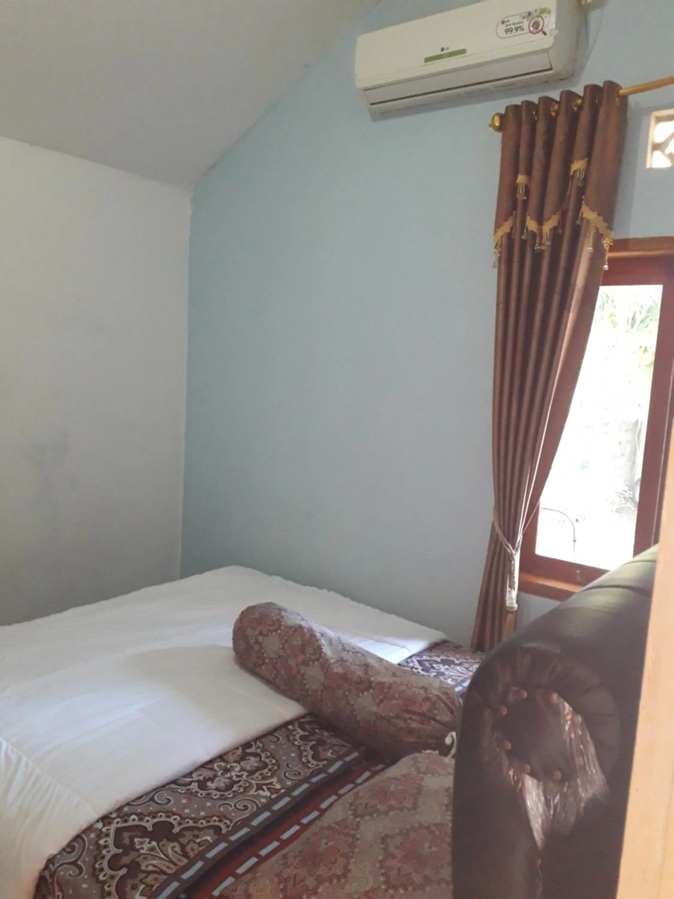 Bed in Fajar Home Stay Batukaras
