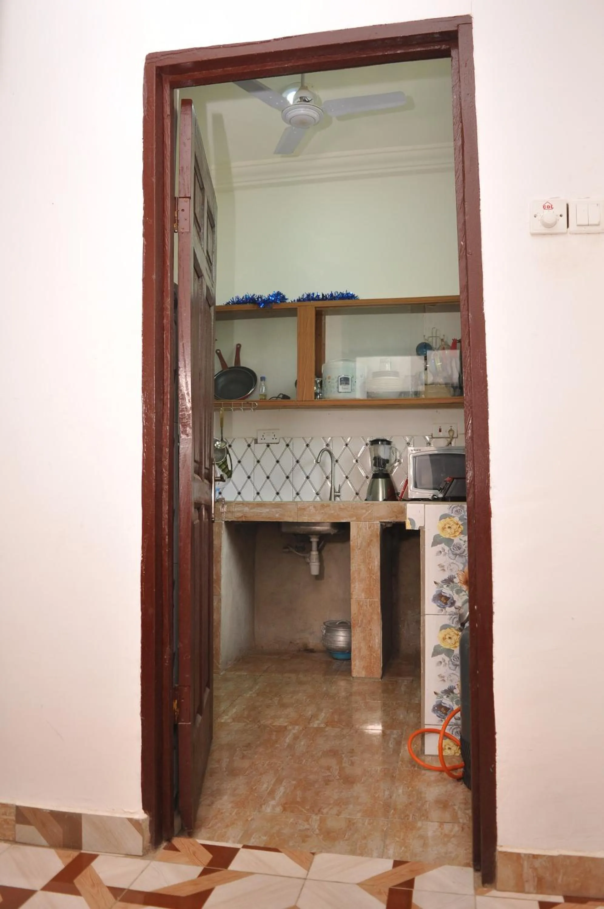 Kitchen or kitchenette in BB Tributary Hotel