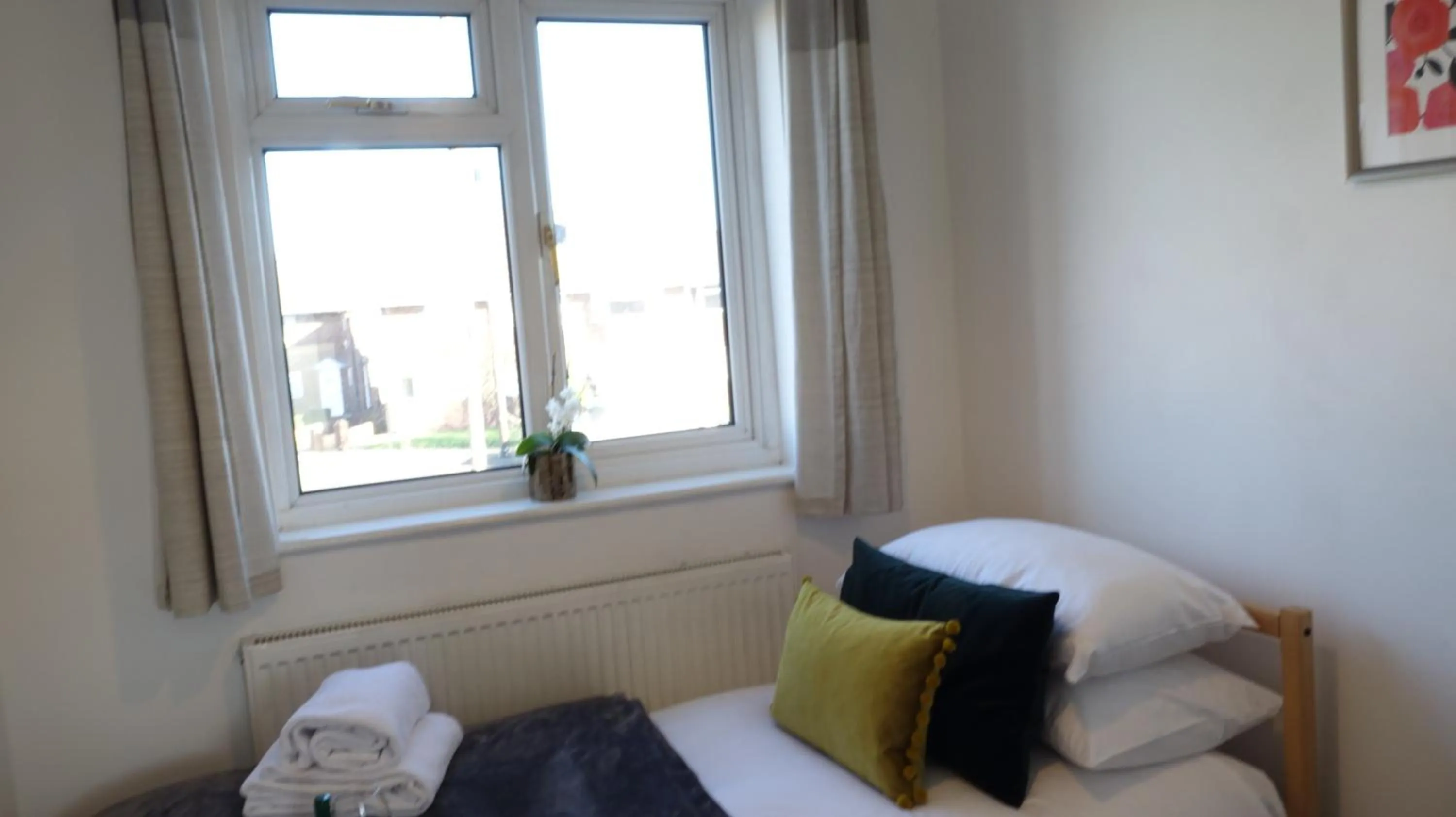 Bedroom in Airport Garden Rooms