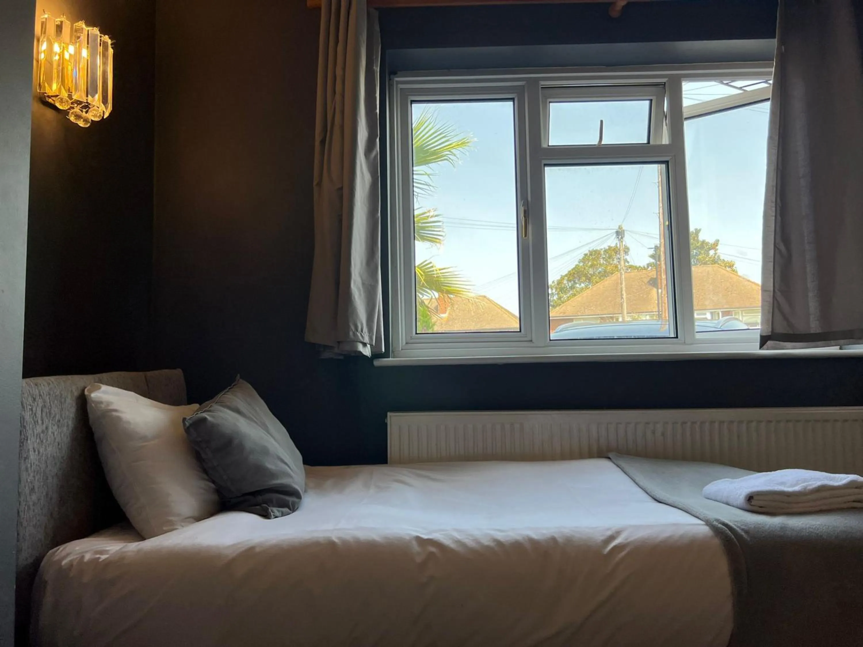 Bed in Airport Garden Rooms