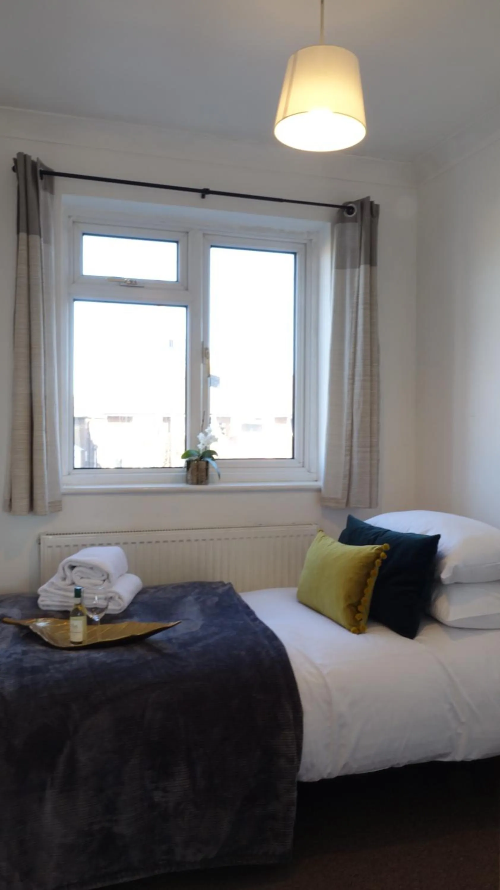 Bedroom in Airport Garden Rooms