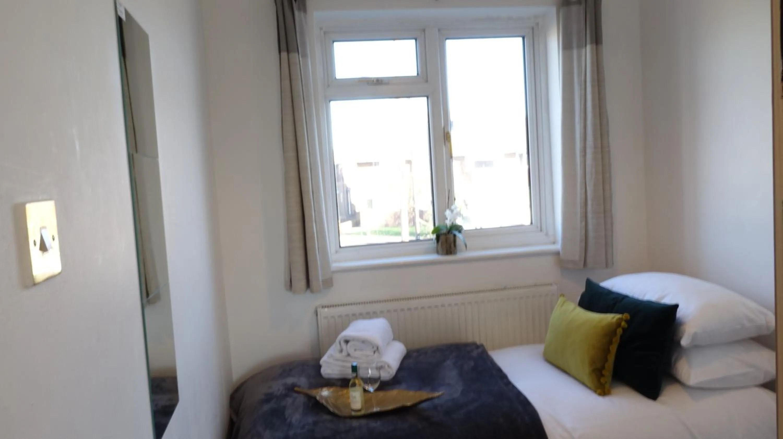 Bedroom in Airport Garden Rooms