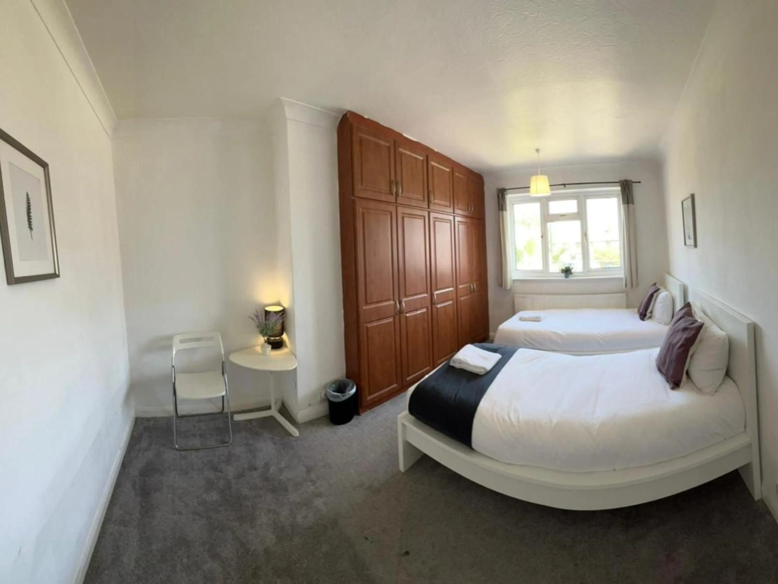 Bed in Airport Garden Rooms