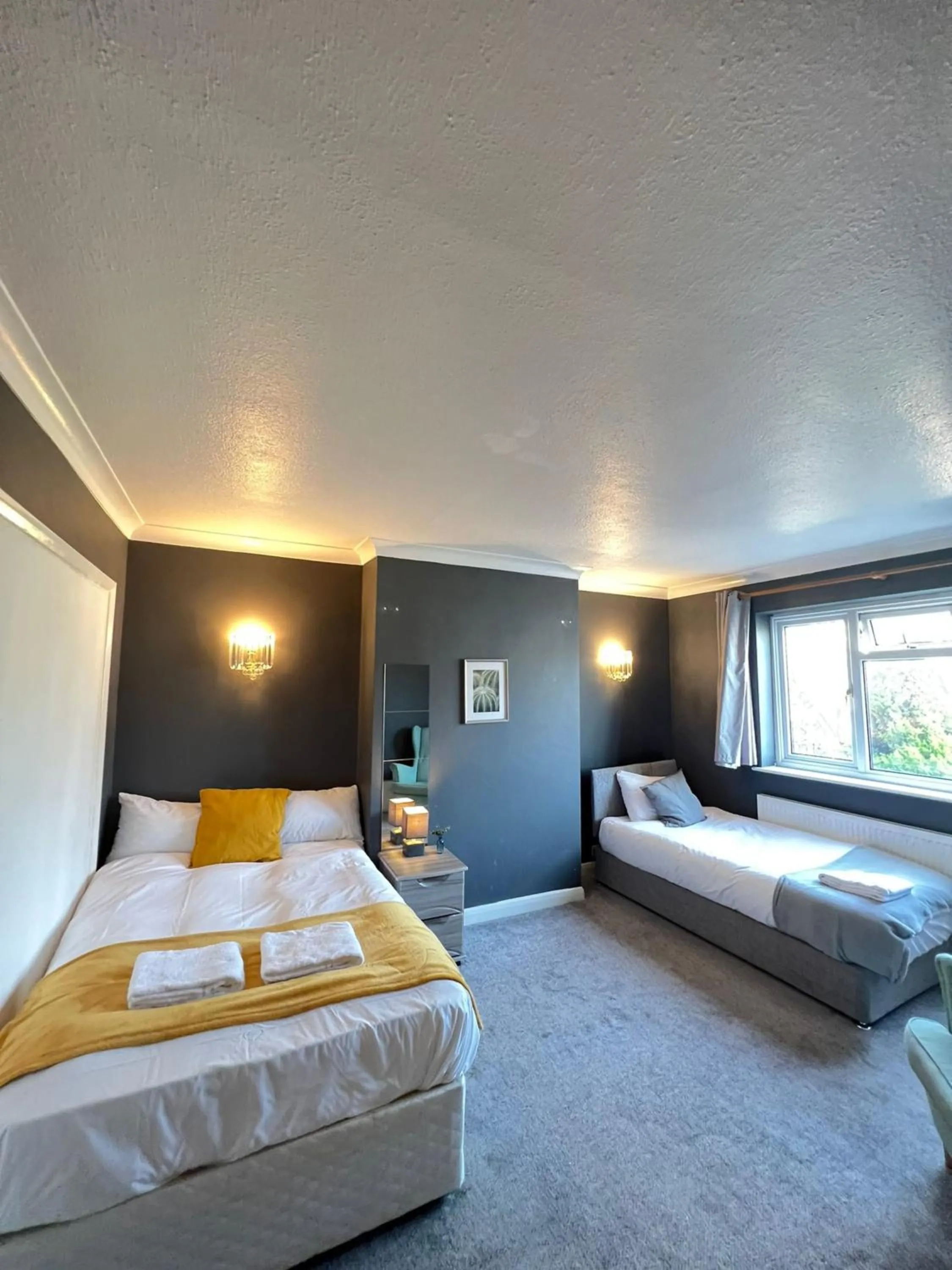 Bed in Airport Garden Rooms