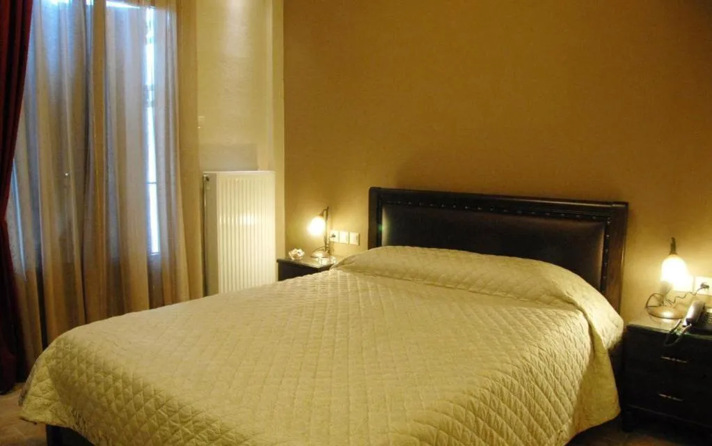 Bed in Hotel Filoxenia