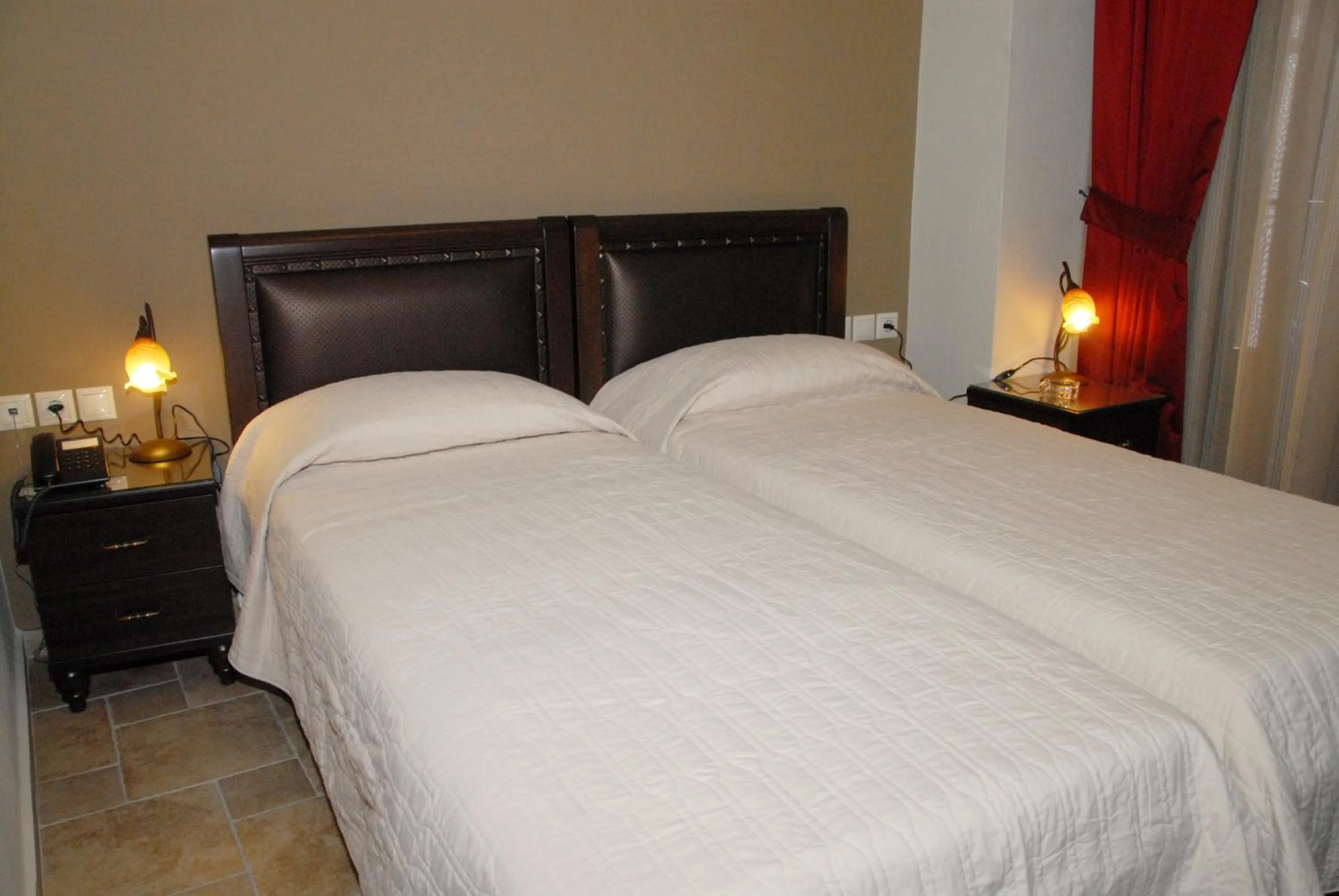 Bed in Hotel Filoxenia