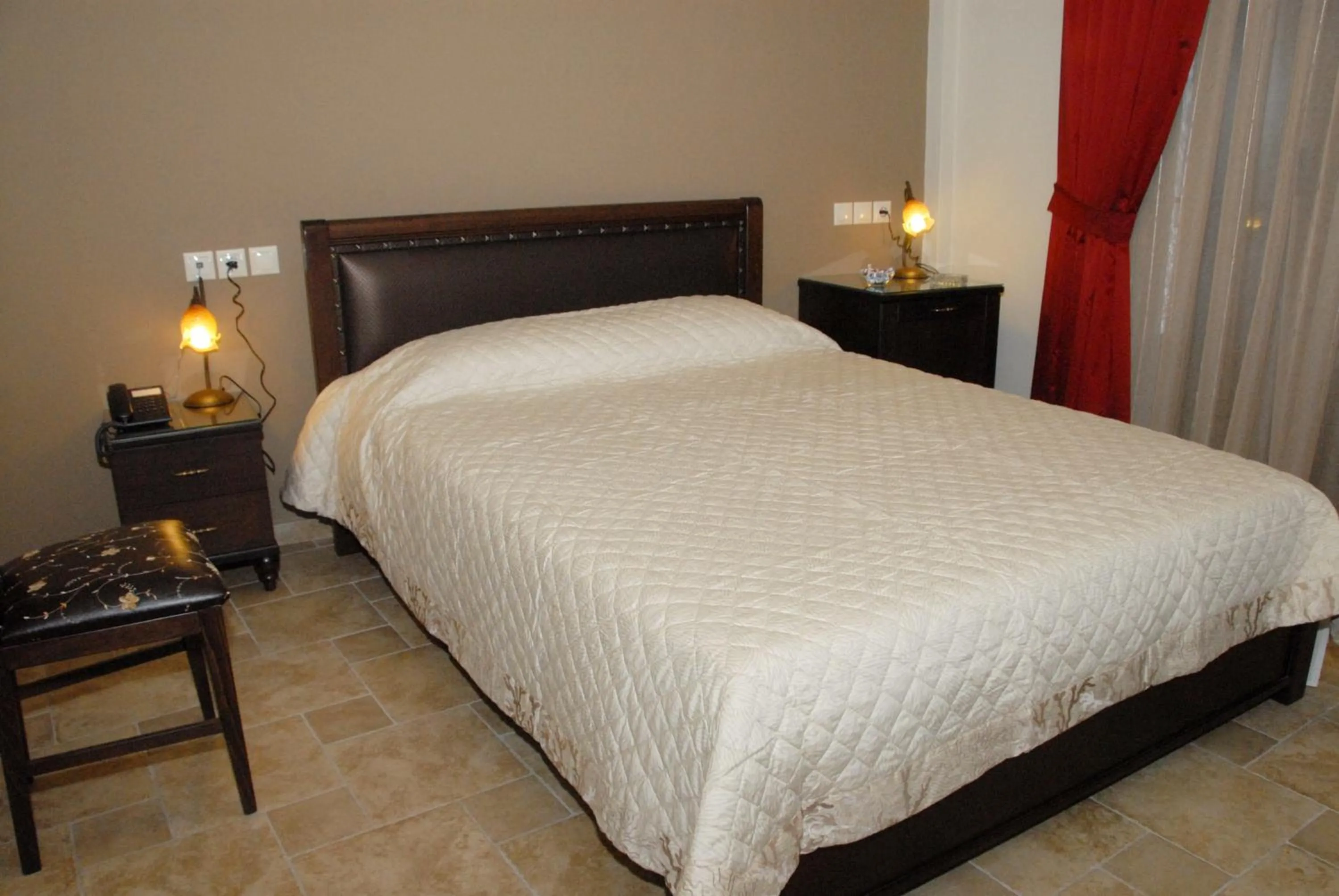 Bed in Hotel Filoxenia