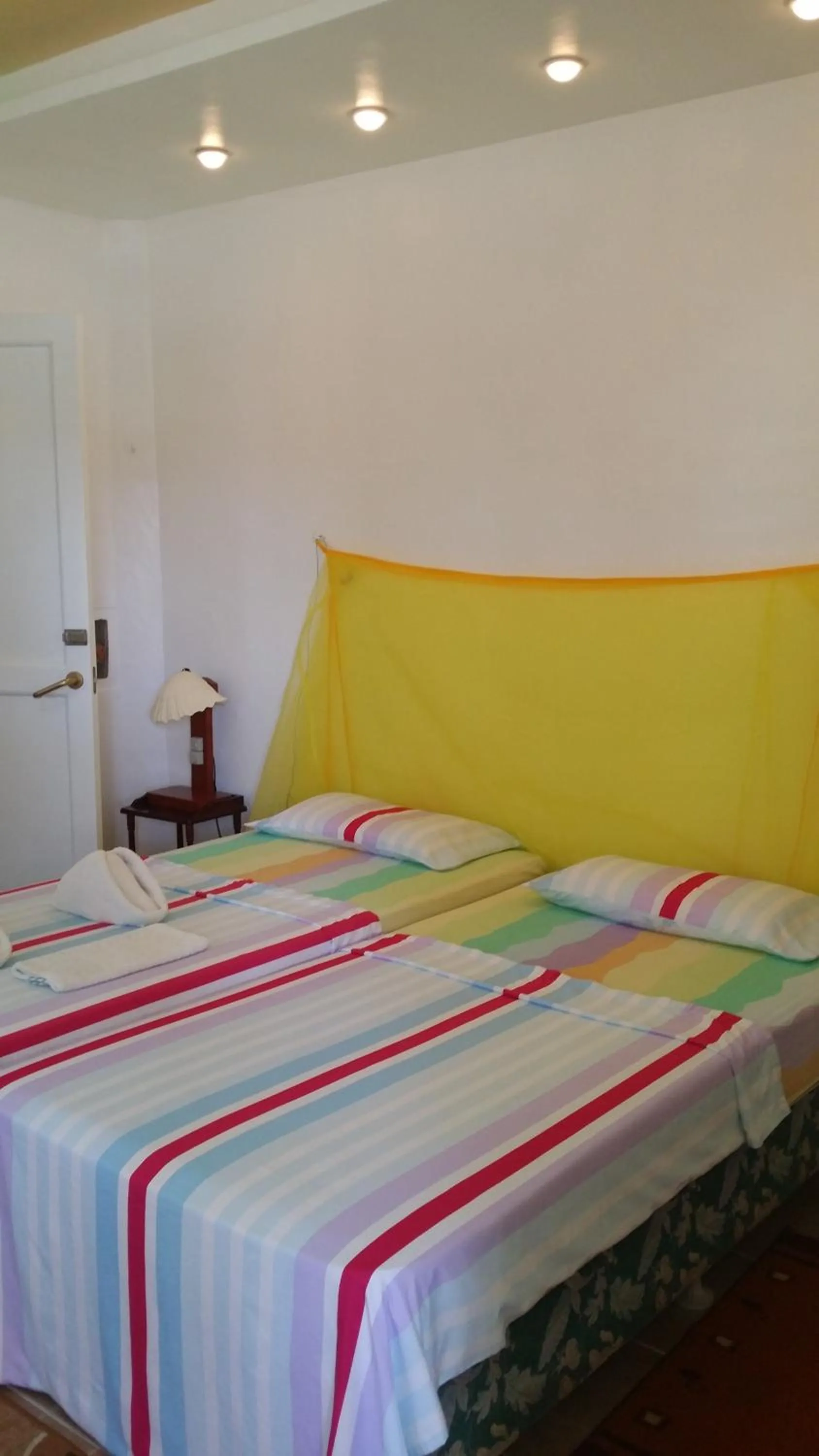 Bed in AABANA Beach & Watersport Resort