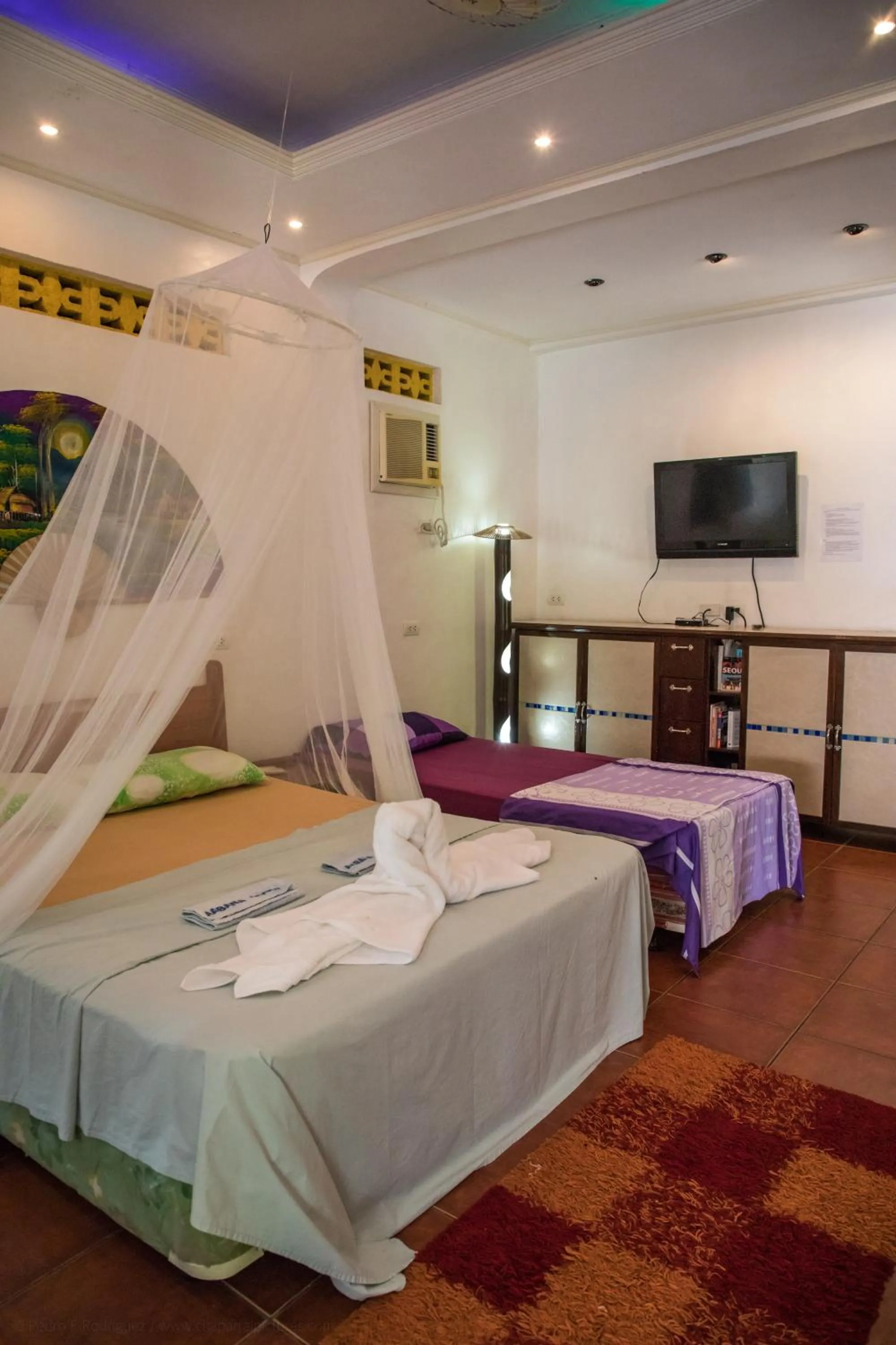 Bed in AABANA Beach & Watersport Resort