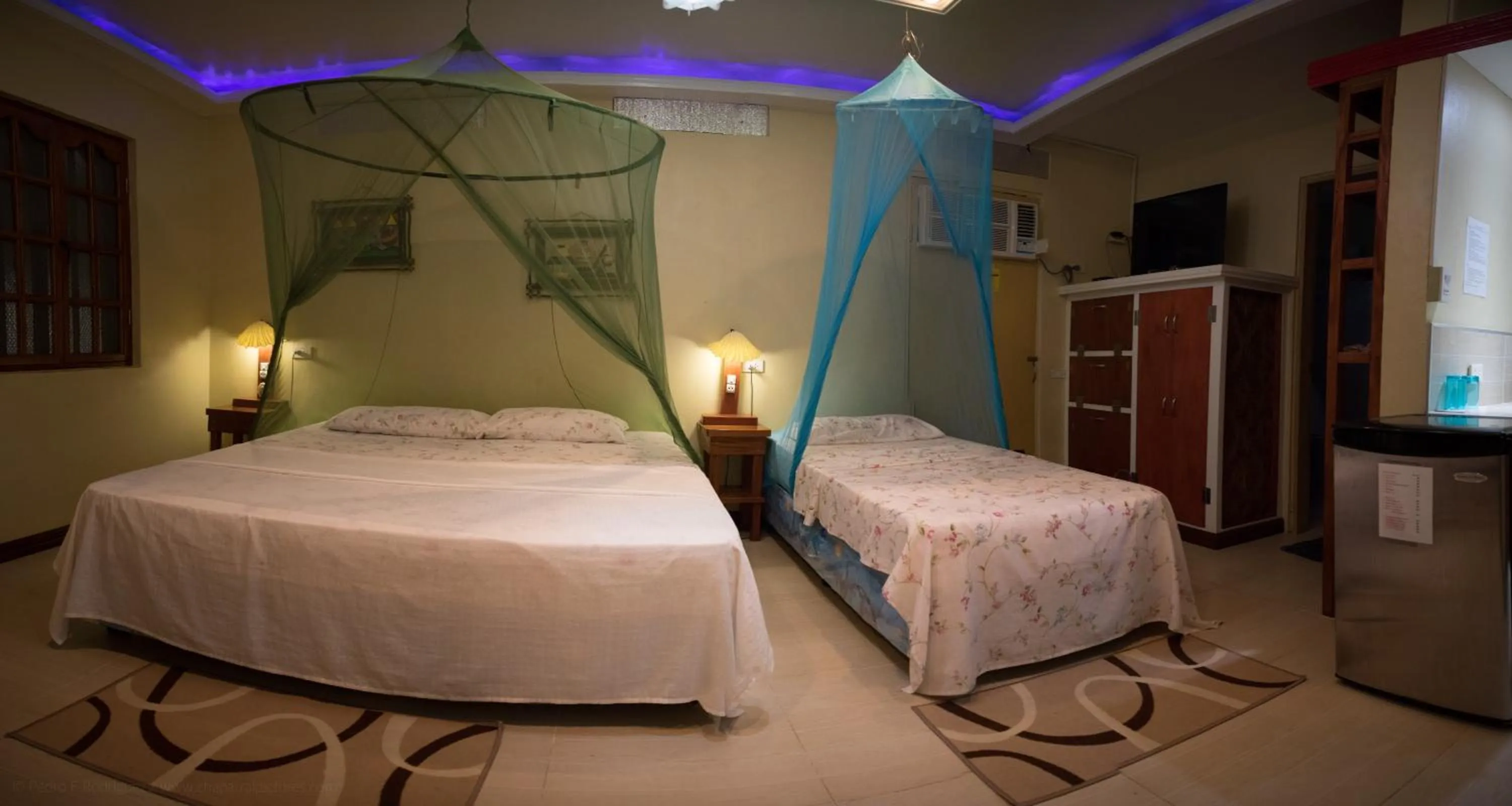 Bed in AABANA Beach & Watersport Resort