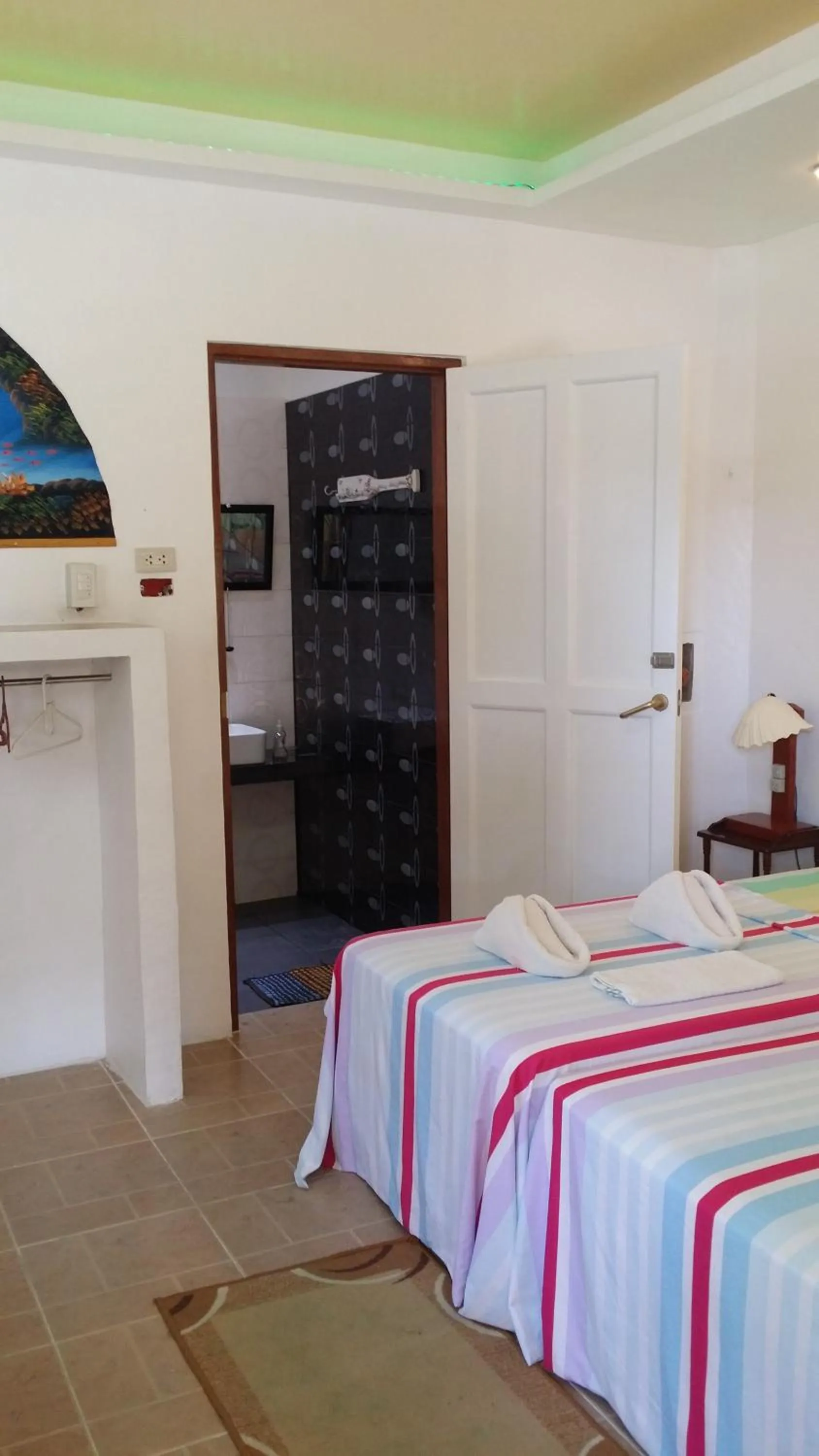 Bed in AABANA Beach & Watersport Resort