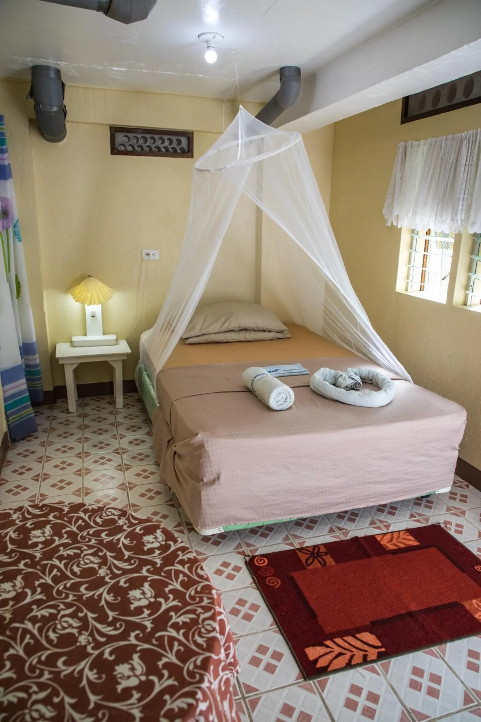 Bed in AABANA Beach & Watersport Resort