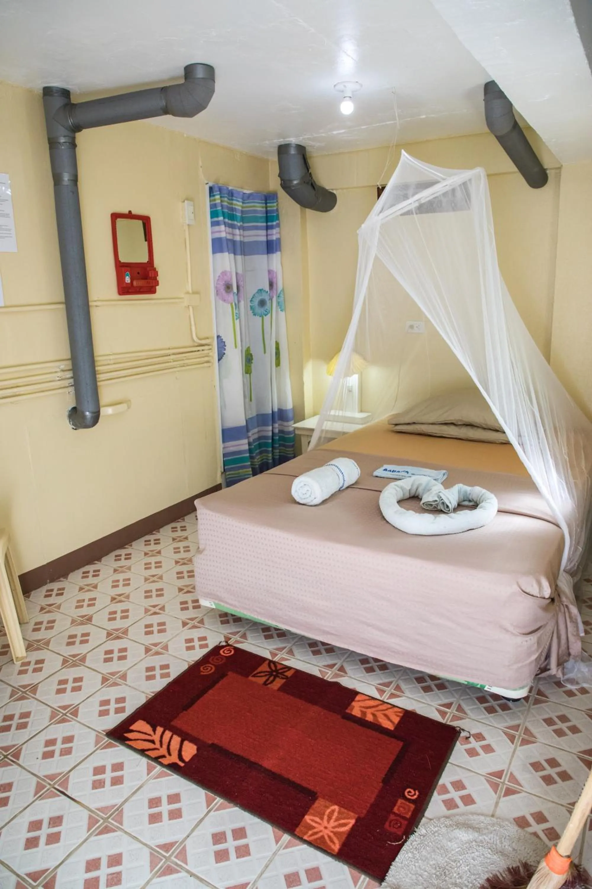 Bed in AABANA Beach & Watersport Resort