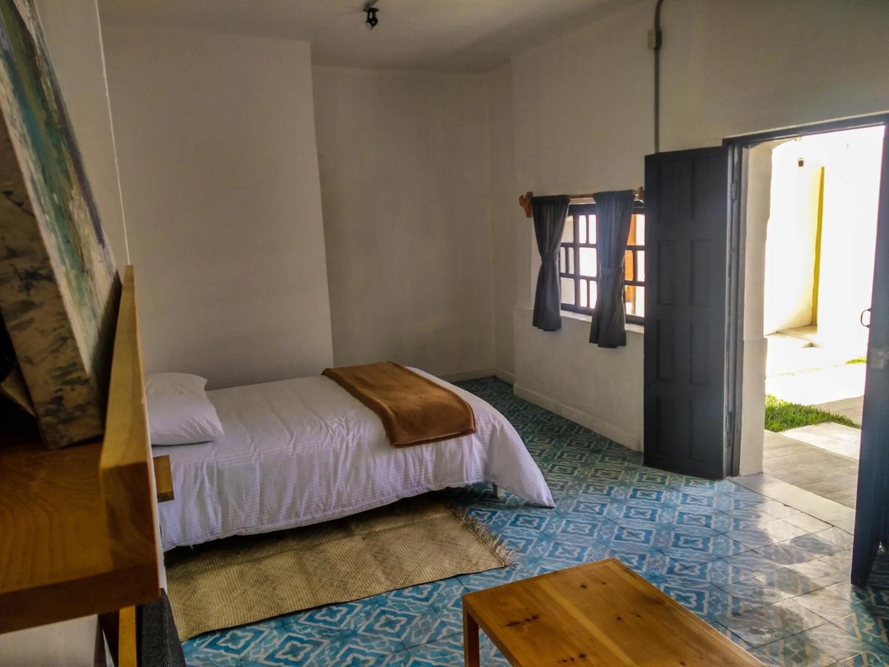 Photo of the whole room, Bed in La Tozi Hotel