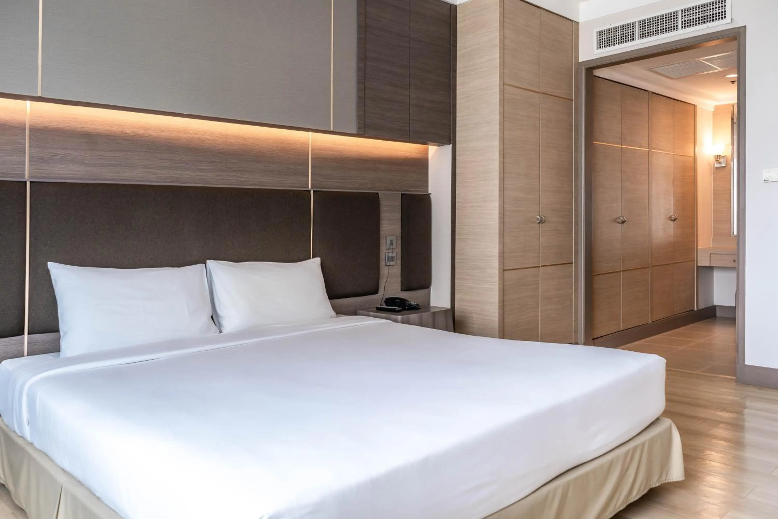 Bed in Jasmine City Hotel