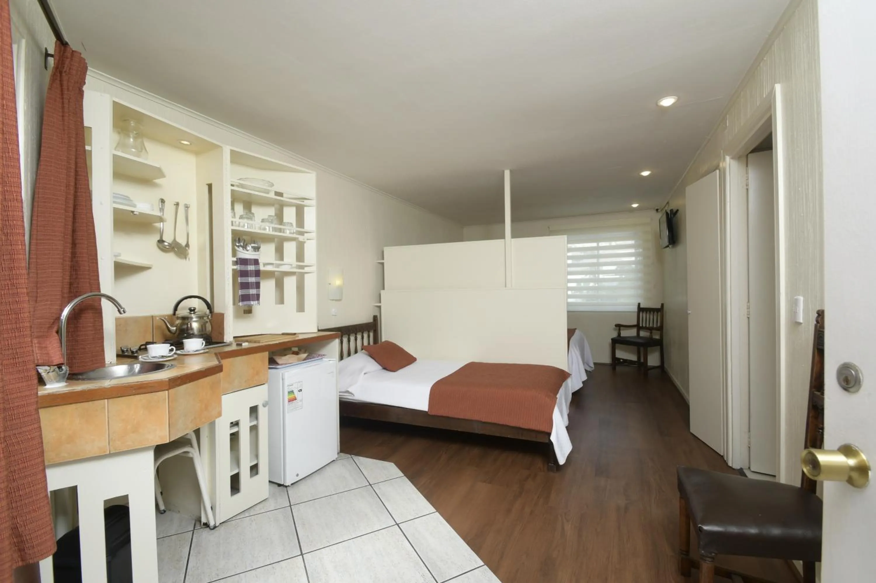 Kitchen or kitchenette, Bed in Dptos Castelar