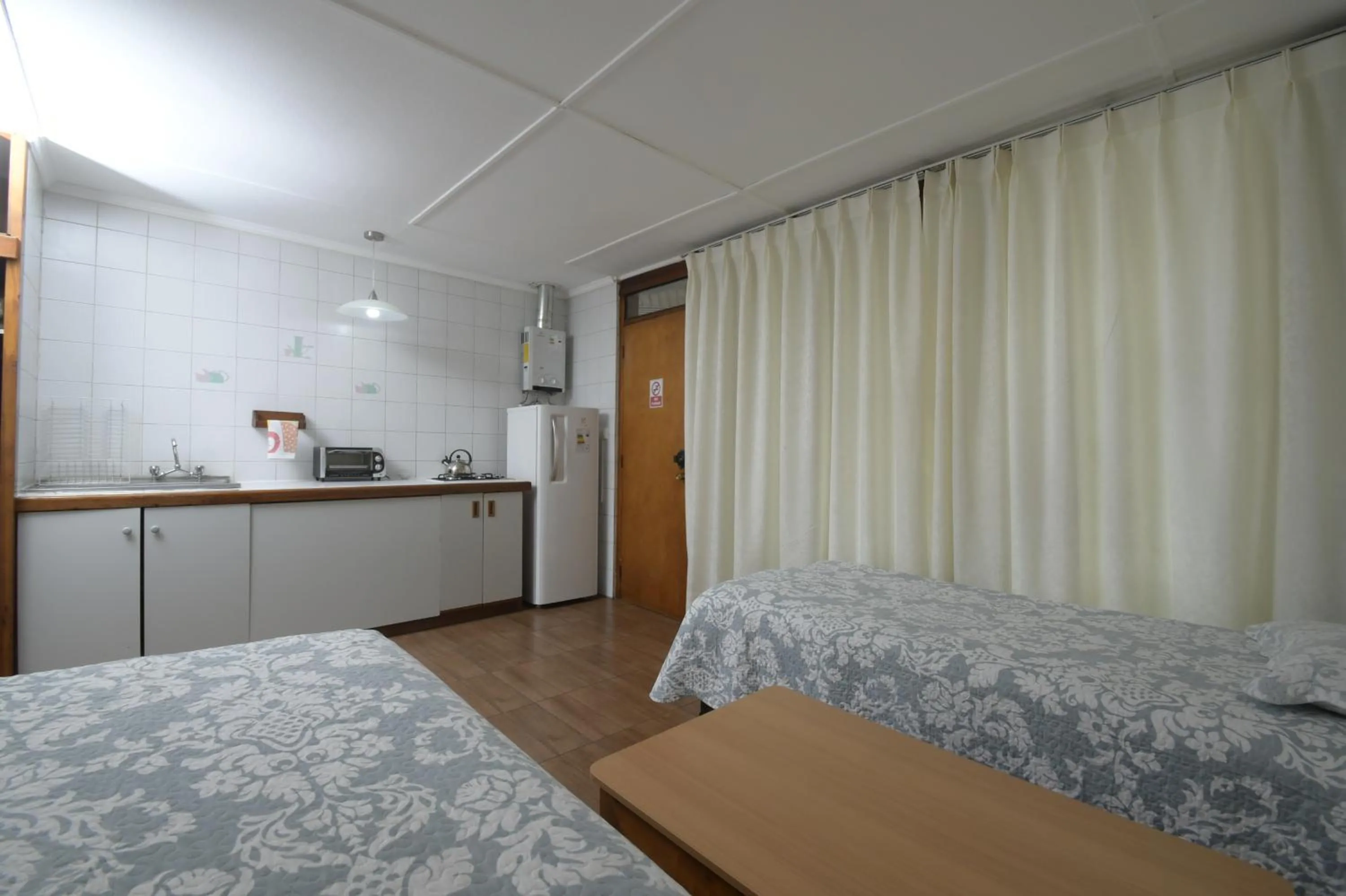 Kitchen or kitchenette, Bed in Dptos Castelar
