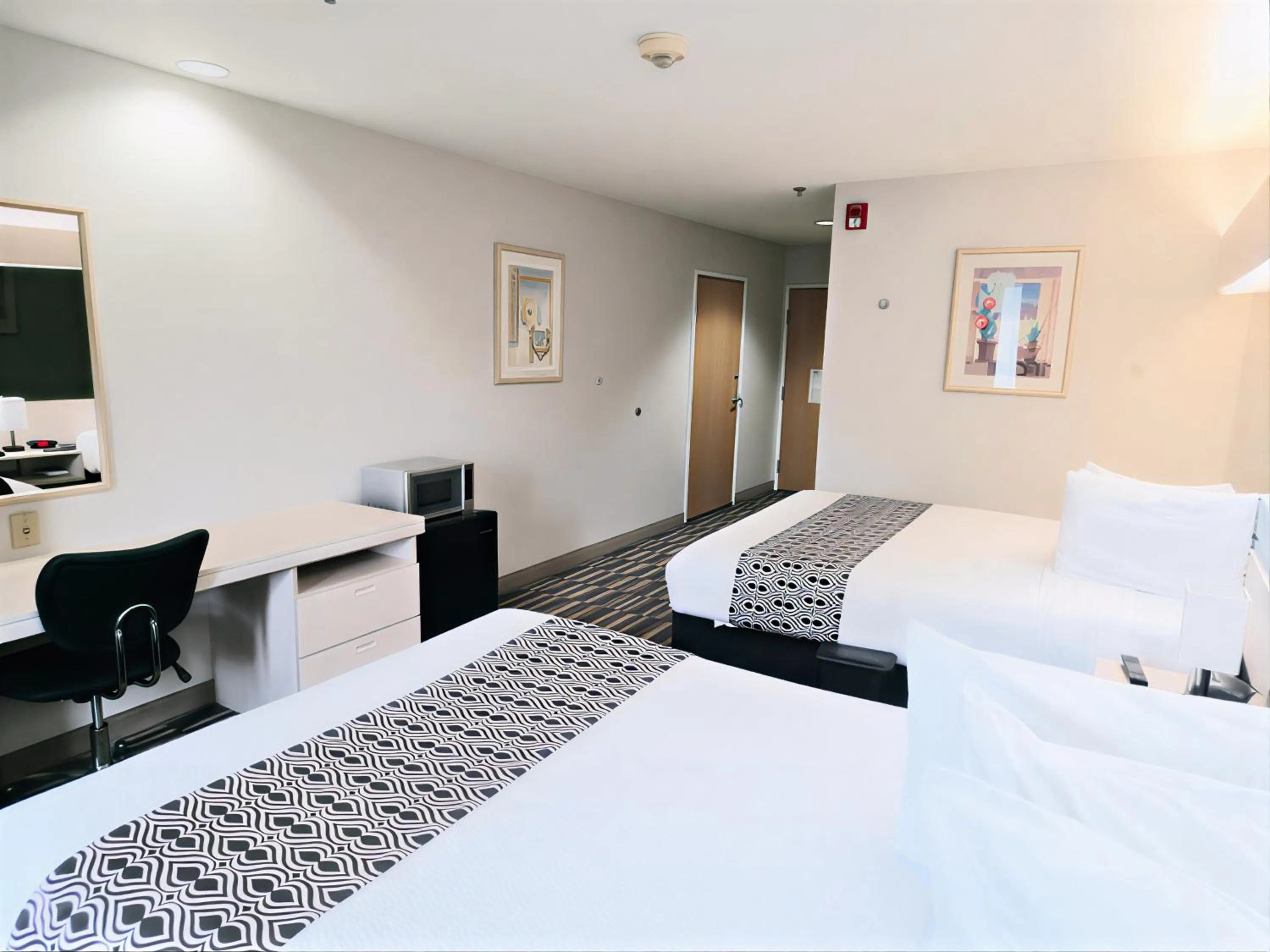 Bed in Microtel Inn & Suites Claremore Route 66