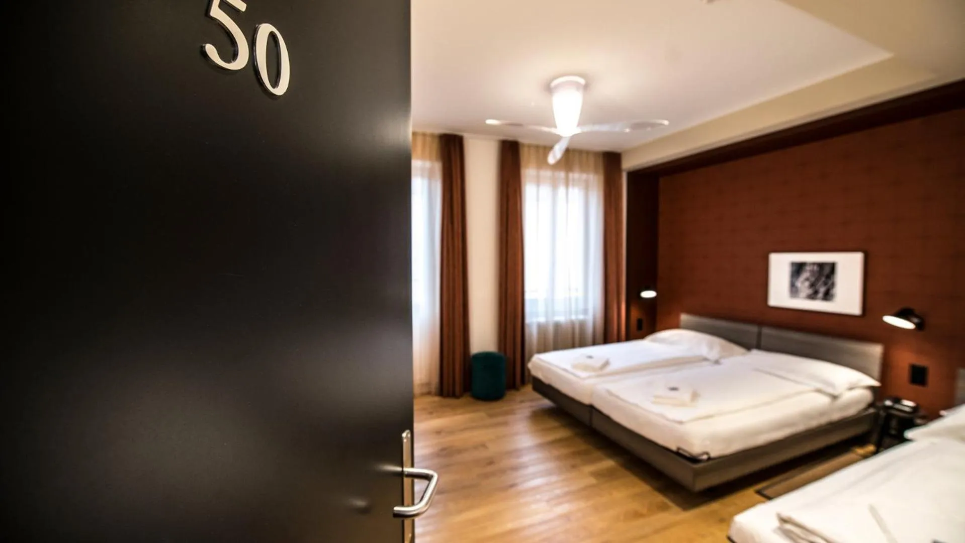 Photo of the whole room, Bed in Hotel Pestalozzi Lugano