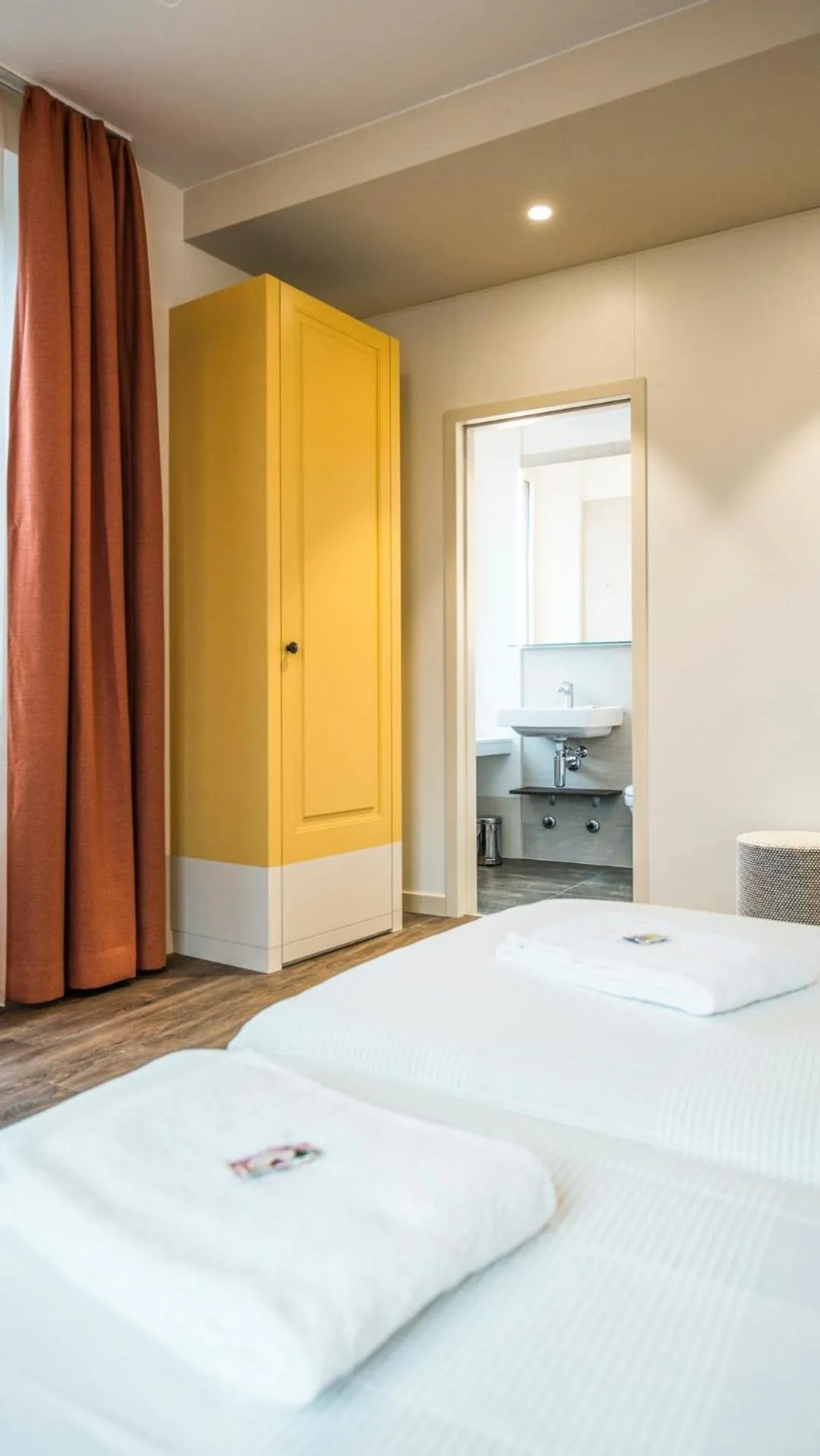 Photo of the whole room, Bed in Hotel Pestalozzi Lugano