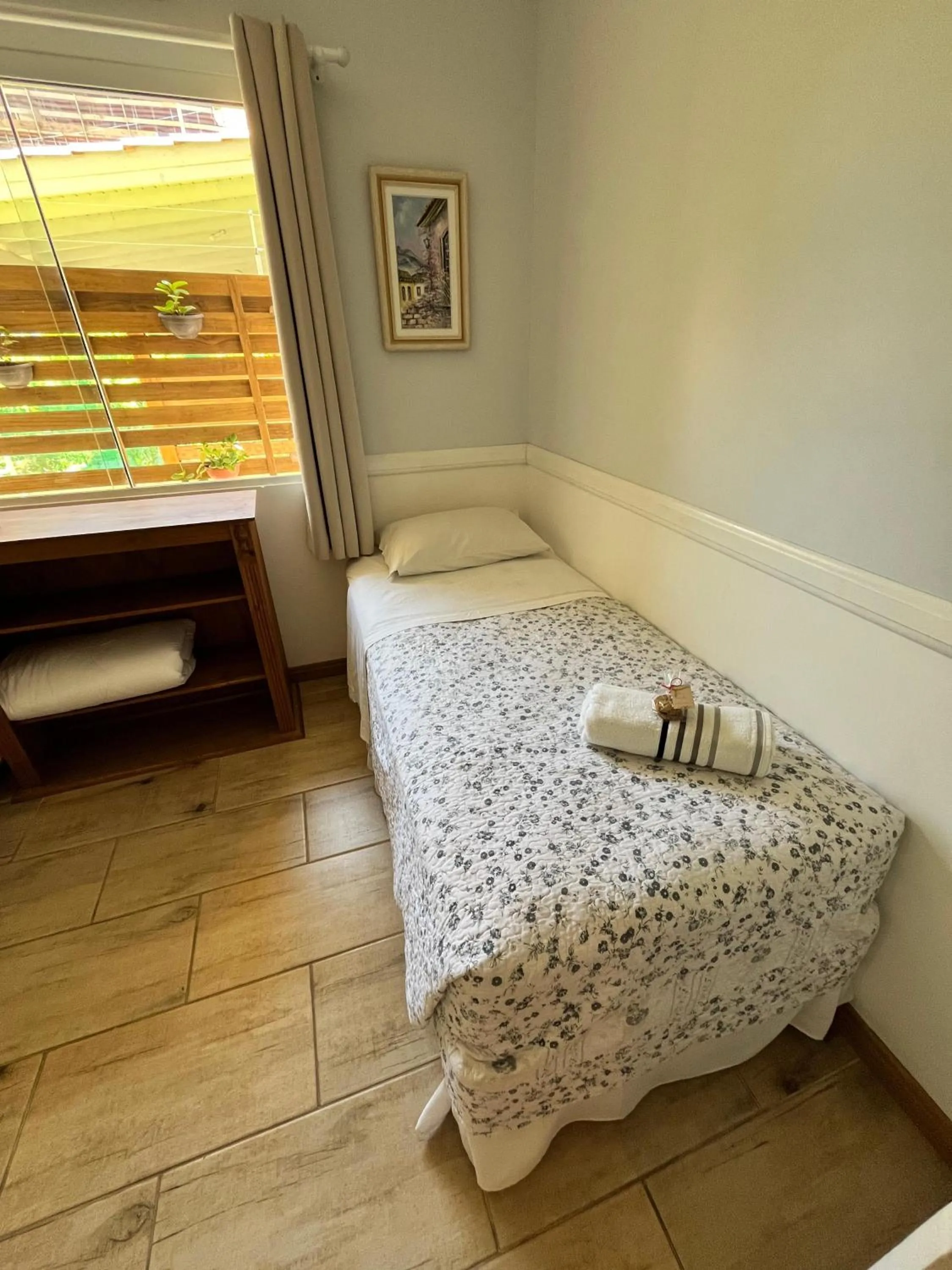 Bed in Pousada Paty´s Garden