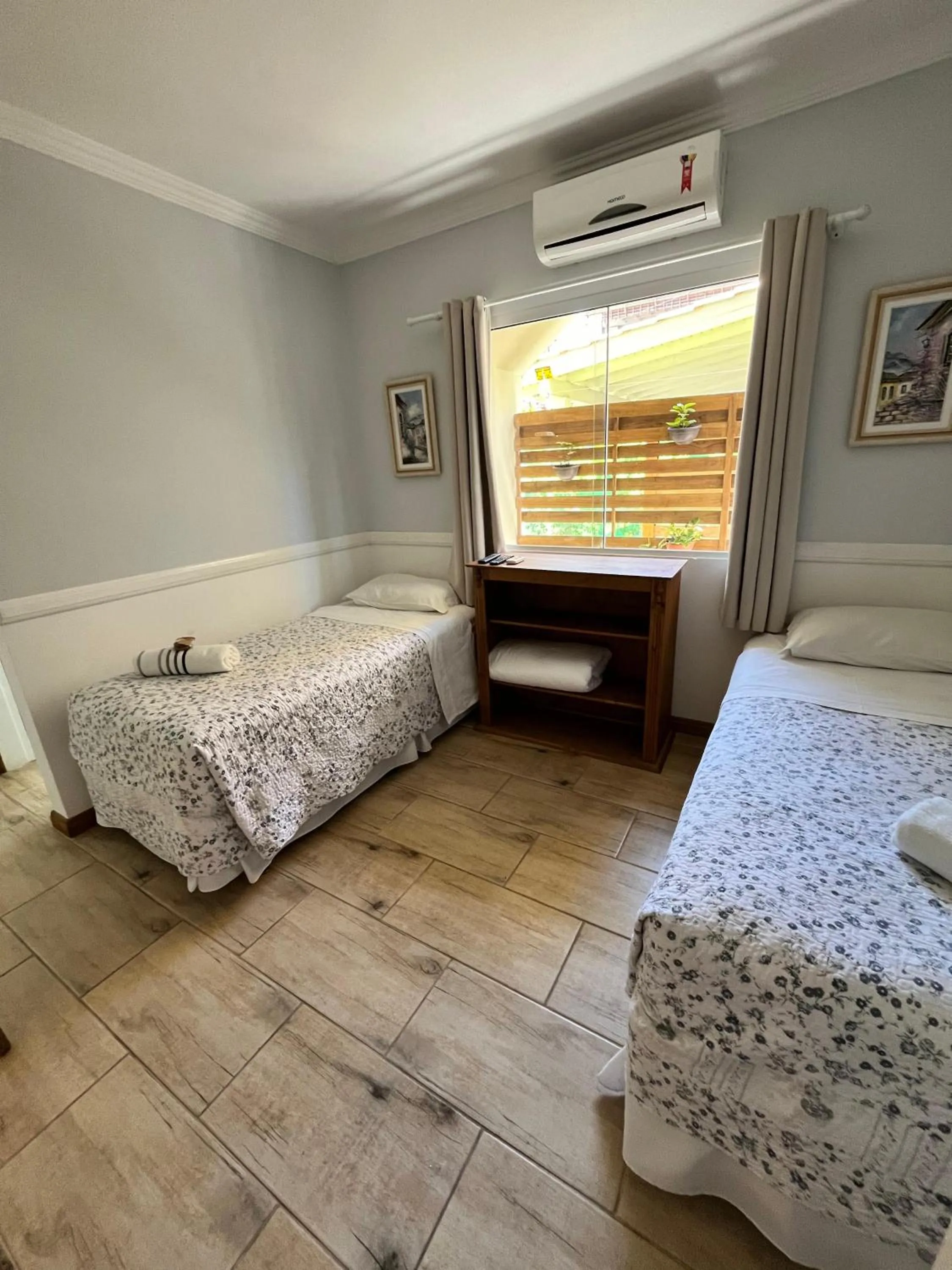 Photo of the whole room, Bed in Pousada Paty´s Garden