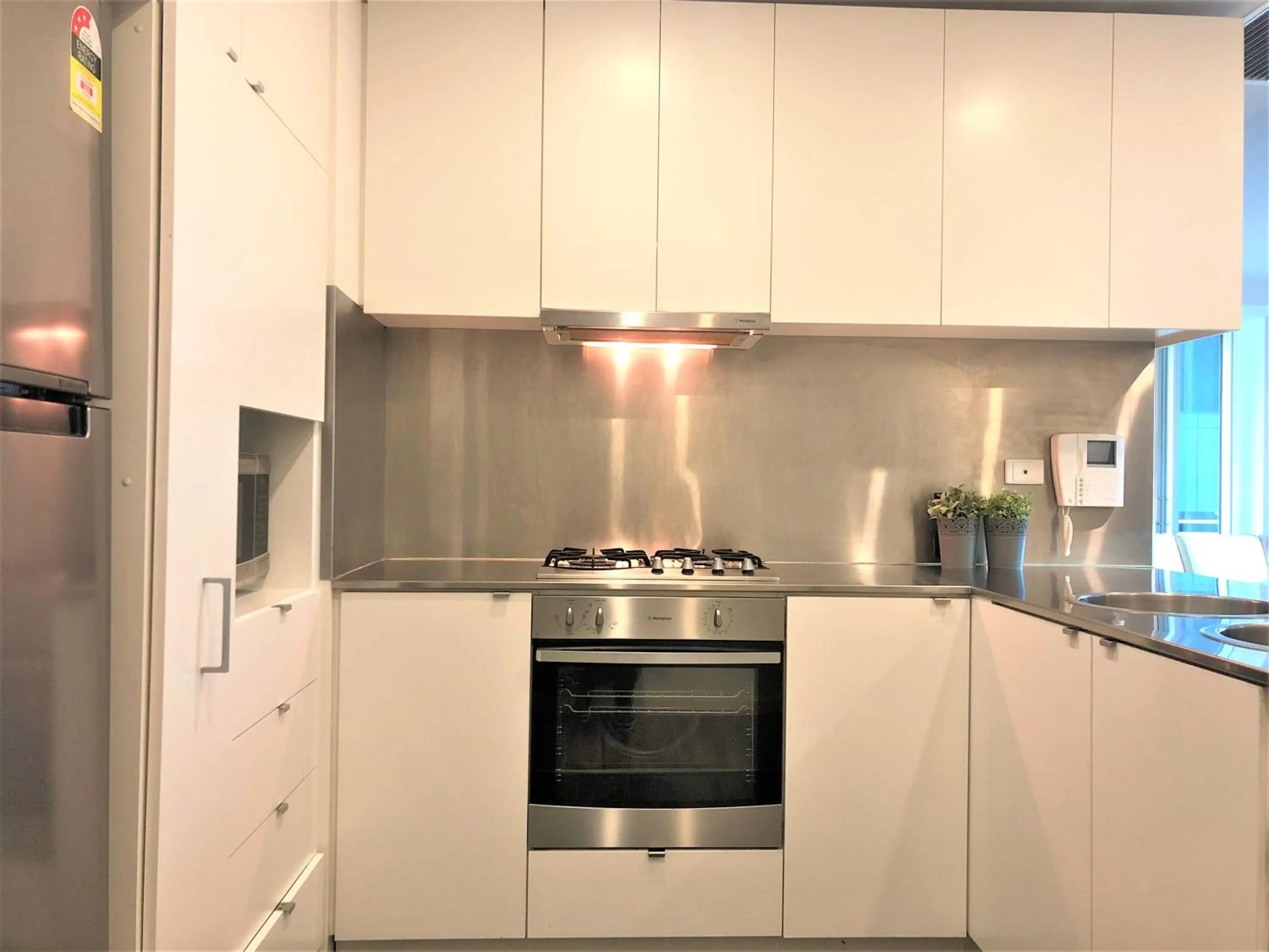 Kitchen or kitchenette in Readyset Apartments at Liberty