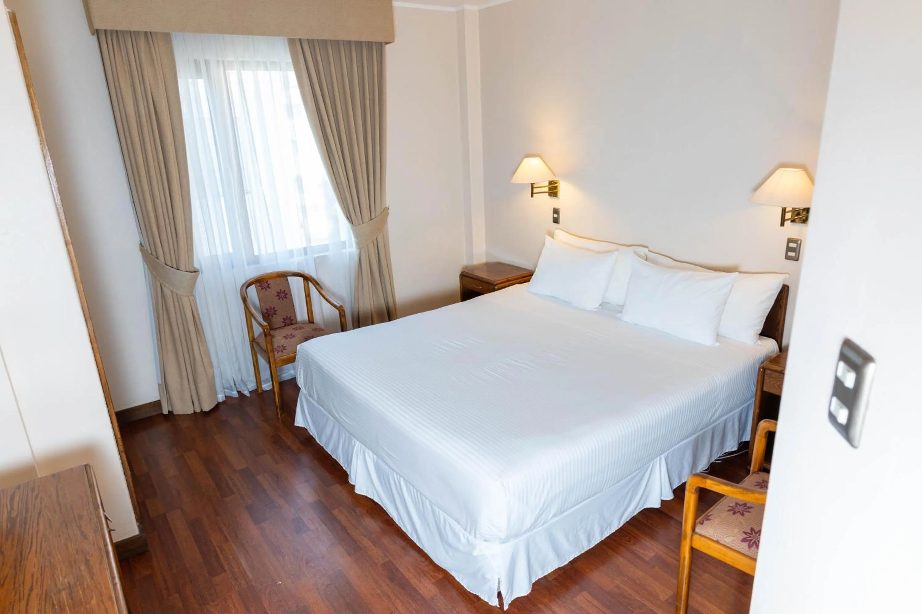 Bed in Hotel Francisco De Aguirre