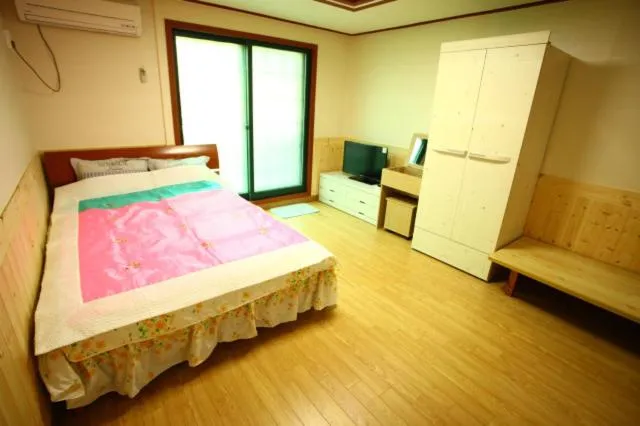 Bed in Bluesky Pension