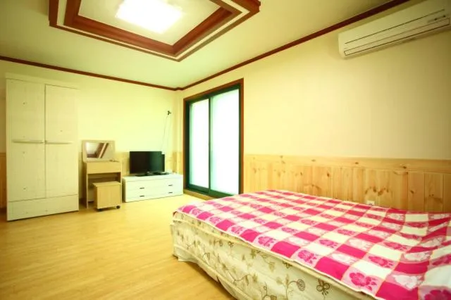 Bed in Bluesky Pension