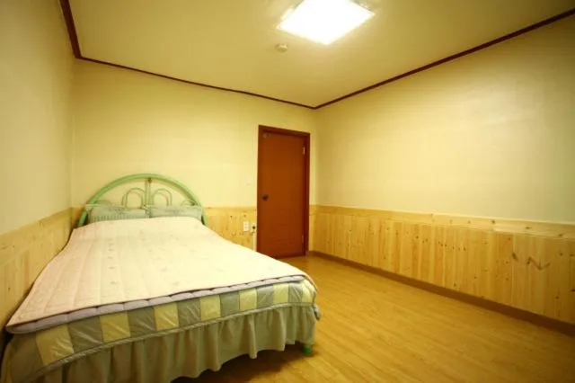 Bed in Bluesky Pension