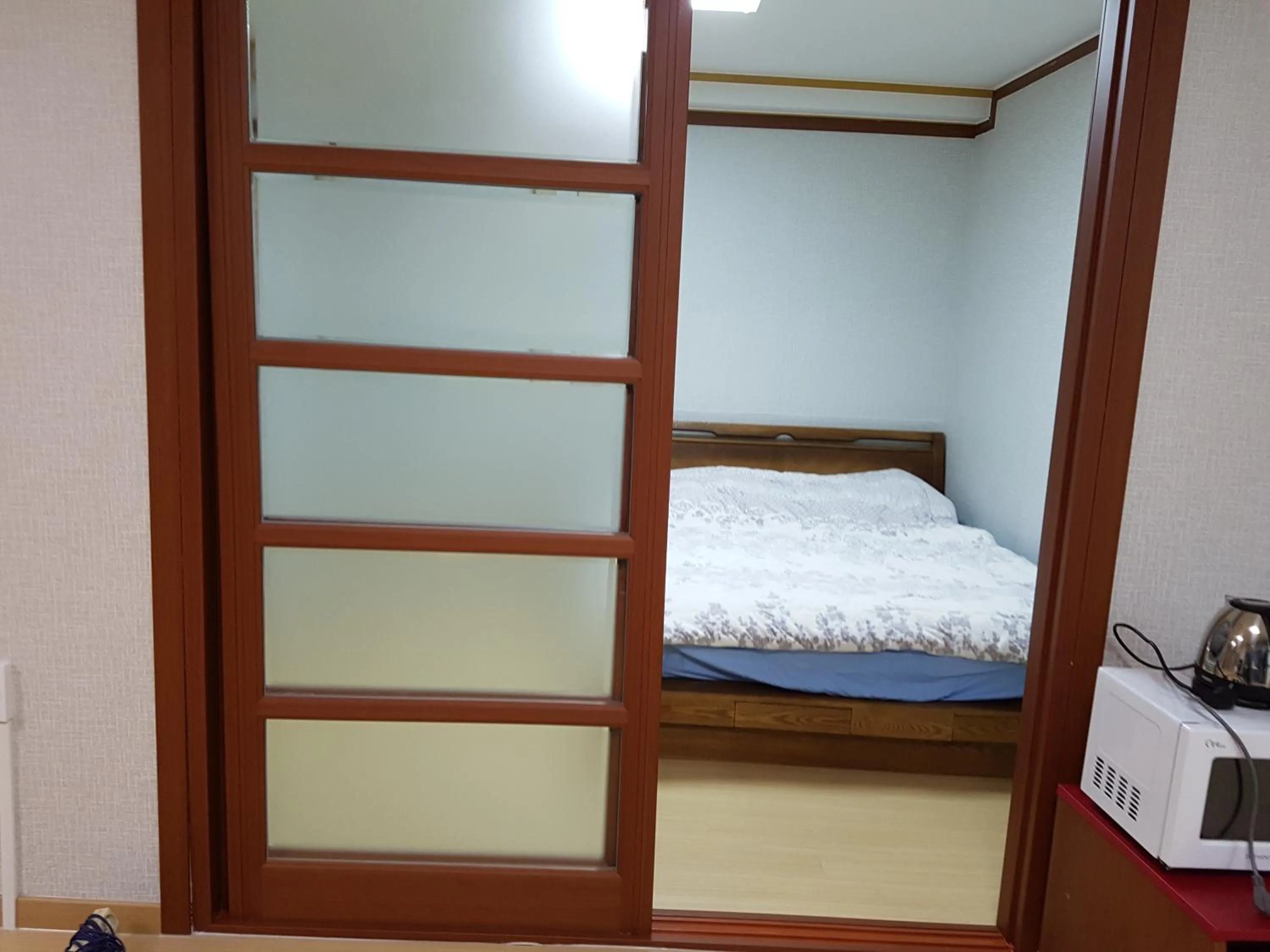 Bed in Bluesky Pension