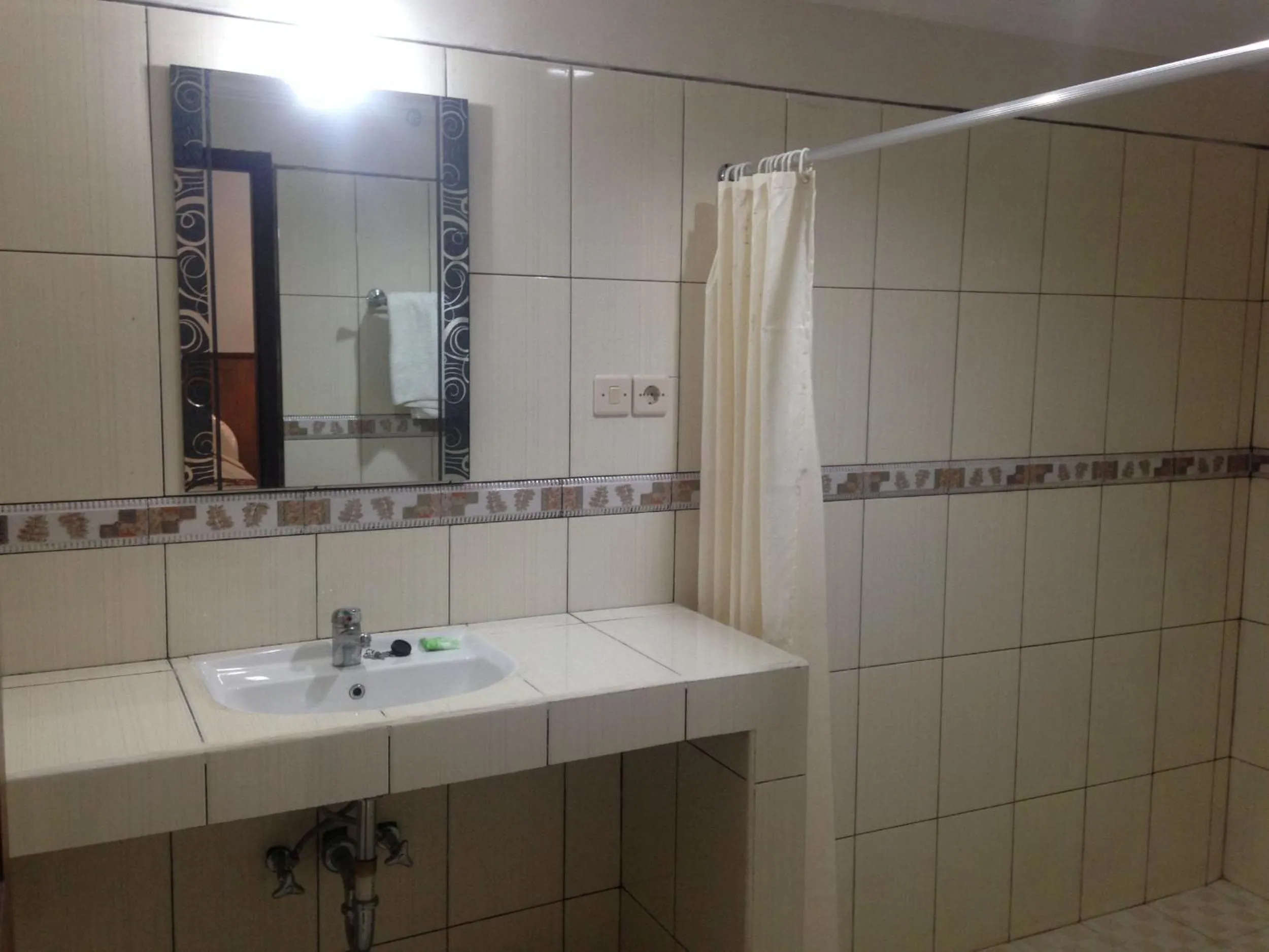 Bathroom in Dewa Bharata Bungalows Candidasa