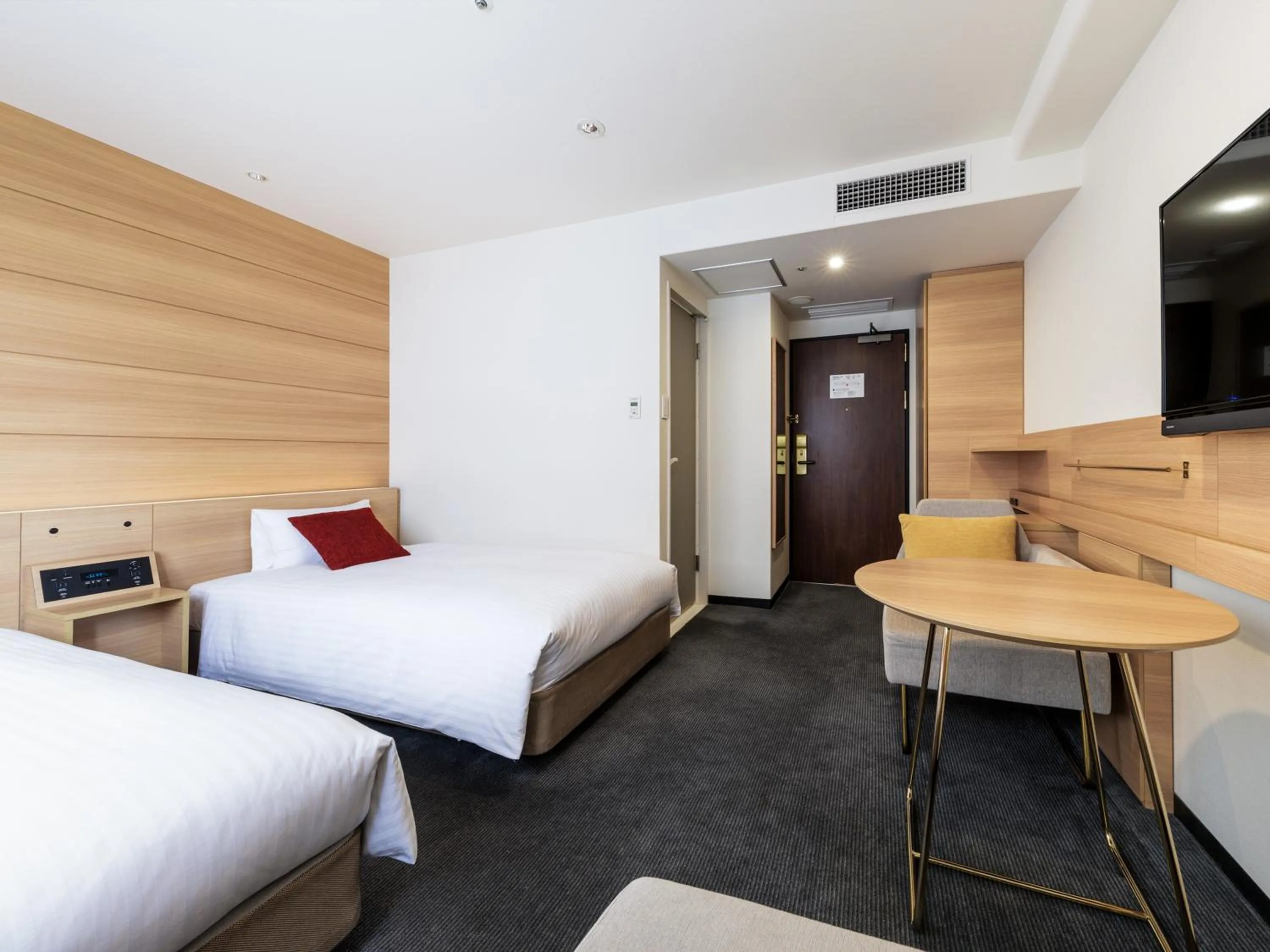 Bed in Nishitetsu Inn Shinjuku