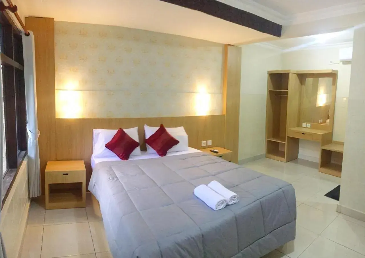Bedroom, Bed in Dewa Bharata Bungalows Legian