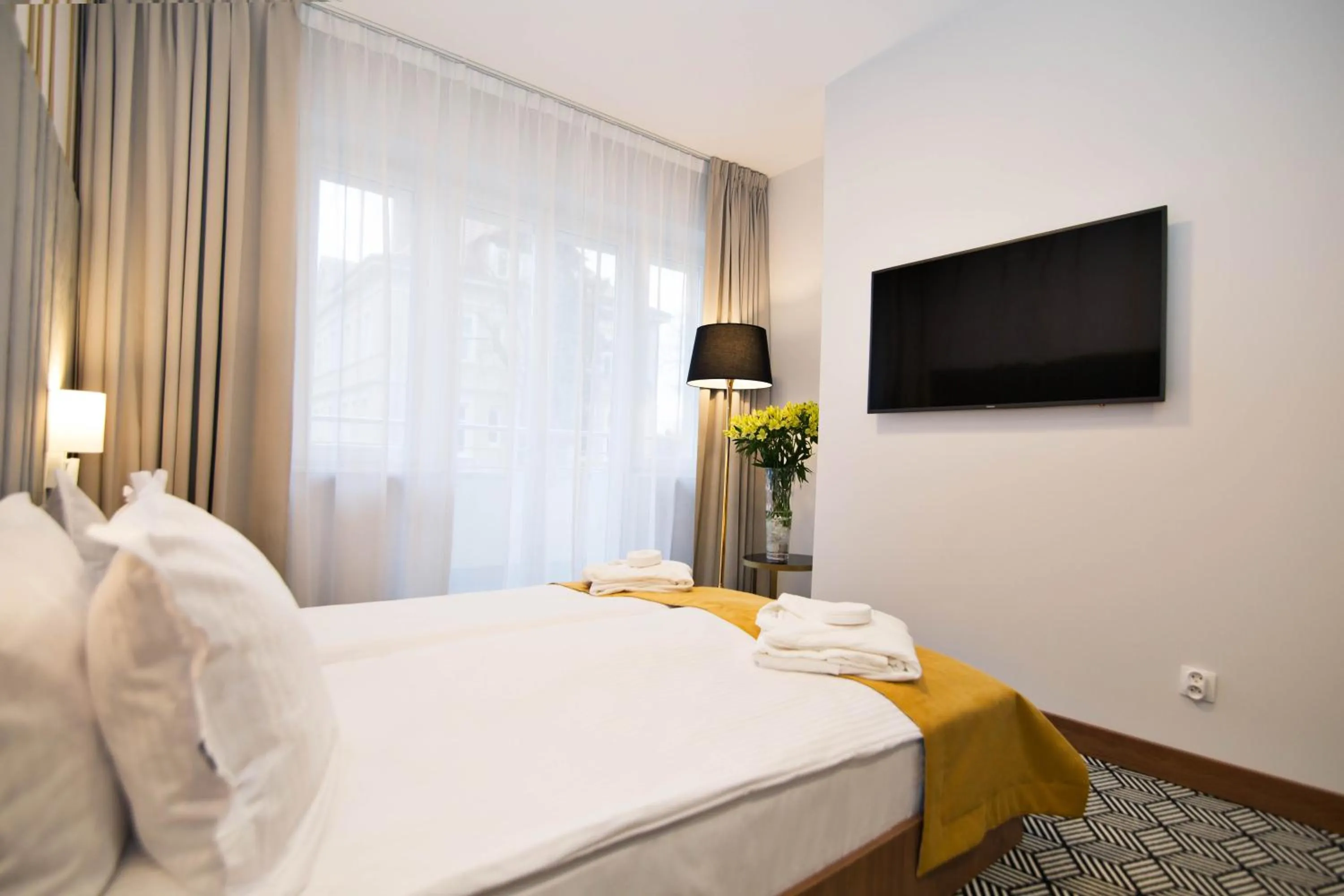 Photo of the whole room, Bed in Platinum Residence Boutique