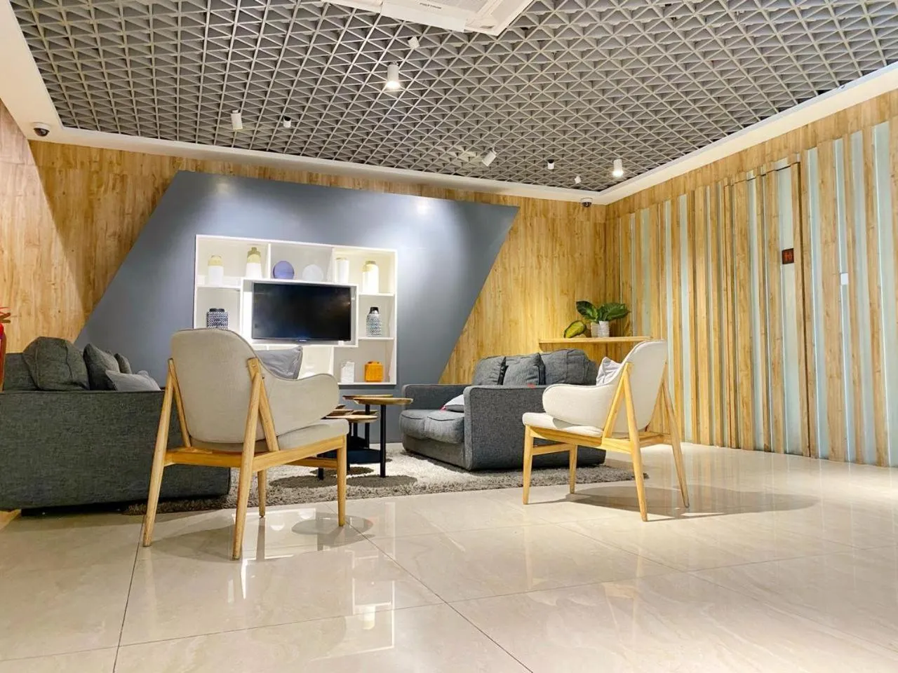 Communal lounge/ TV room in Juno Jatinegara Jakarta