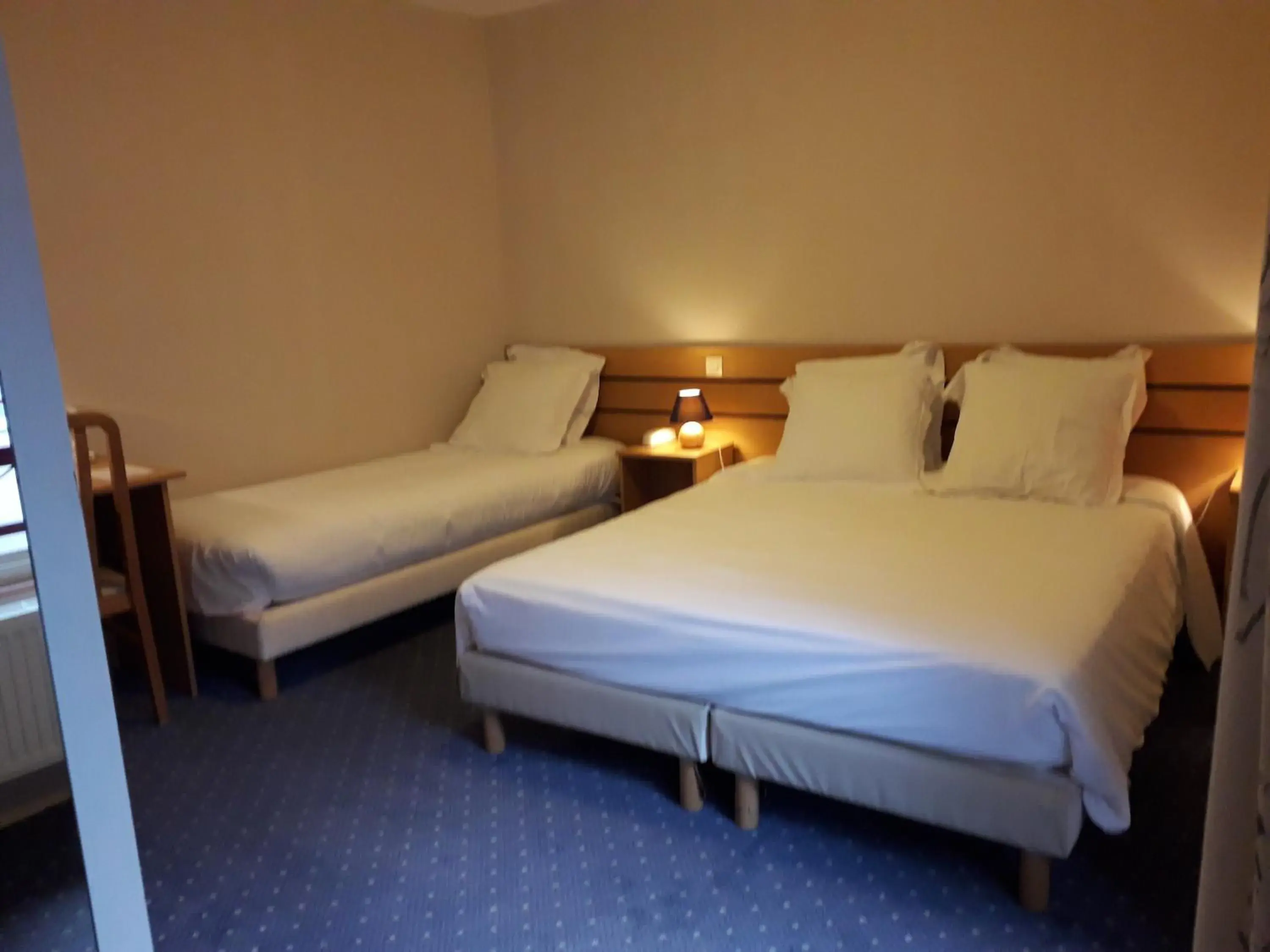 Bed in Logis La Renaissance Bed in Logis La Renaissance