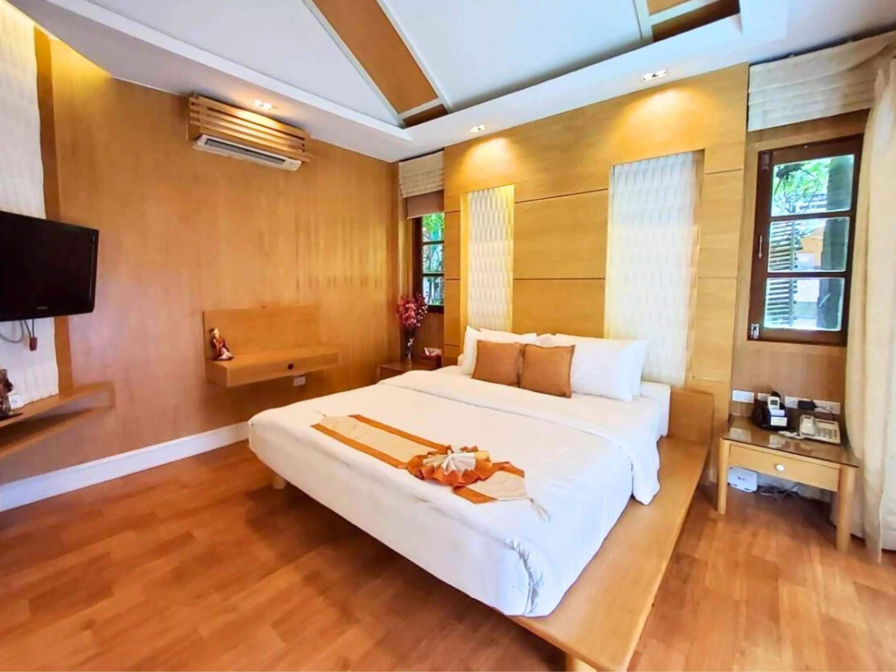 Bed in Vartika Resovilla Kuiburi Beach Resort and Villas