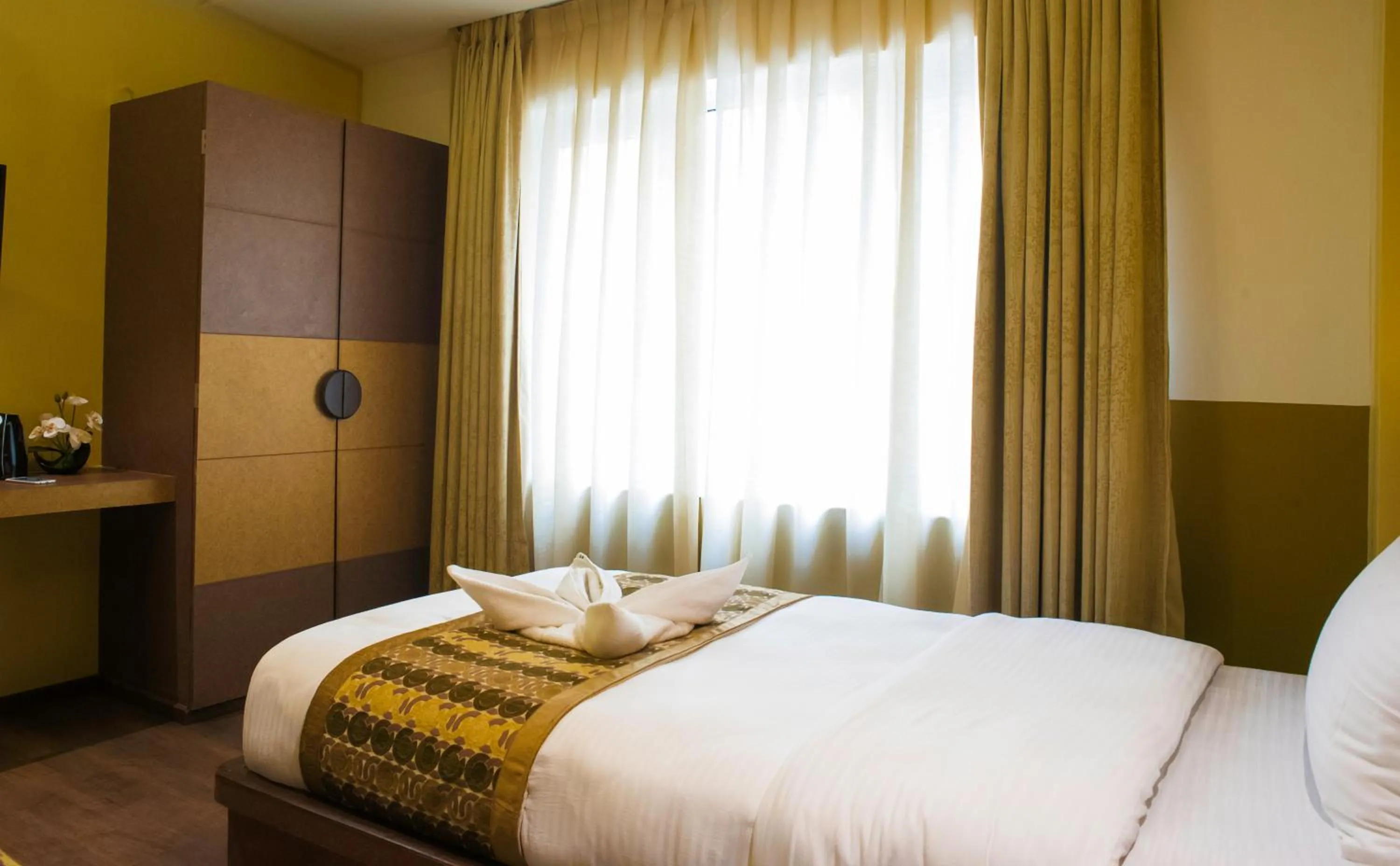 Bed in Bodhi Boutique Hotel