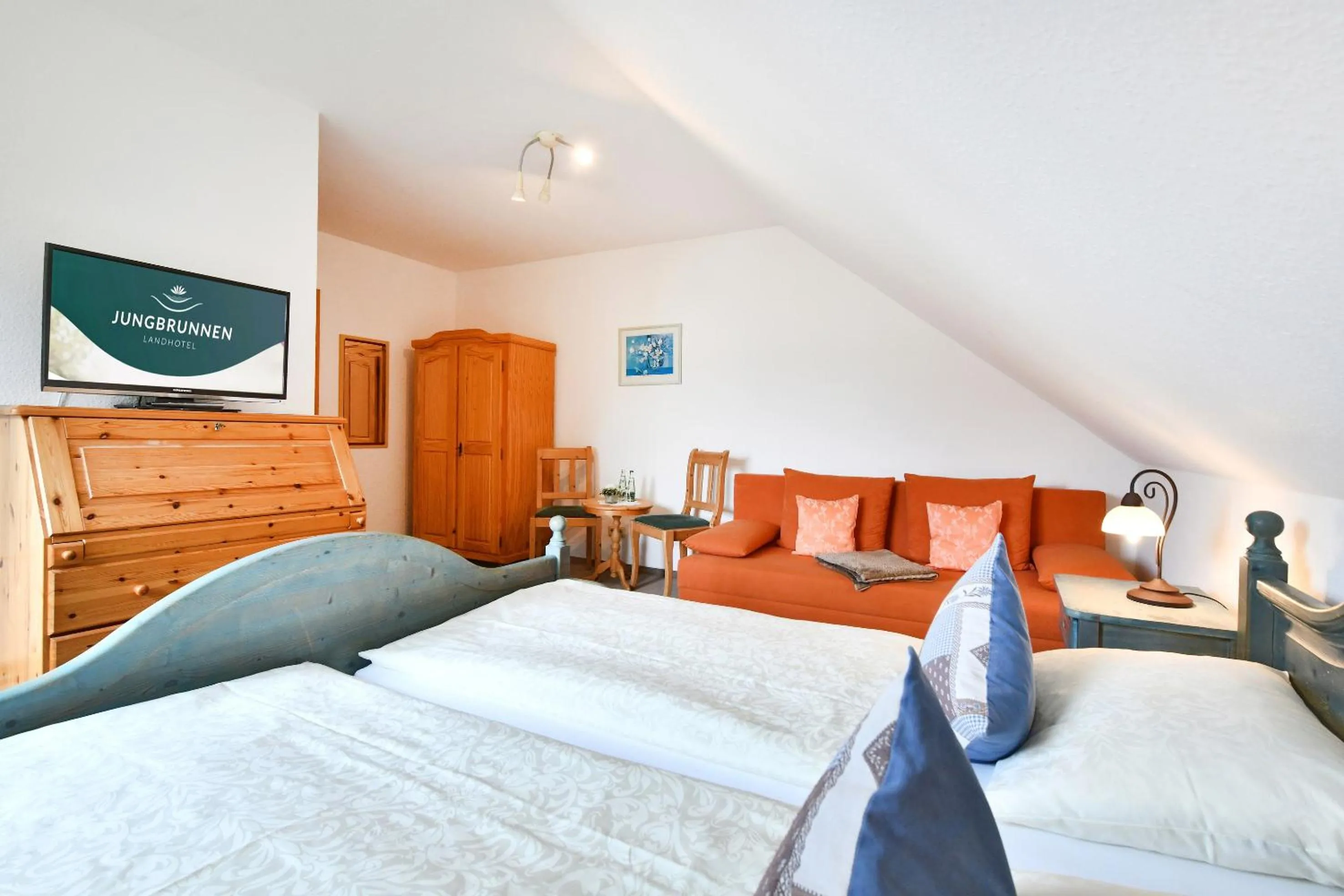 Photo of the whole room, Bed in Landhotel Jungbrunnen