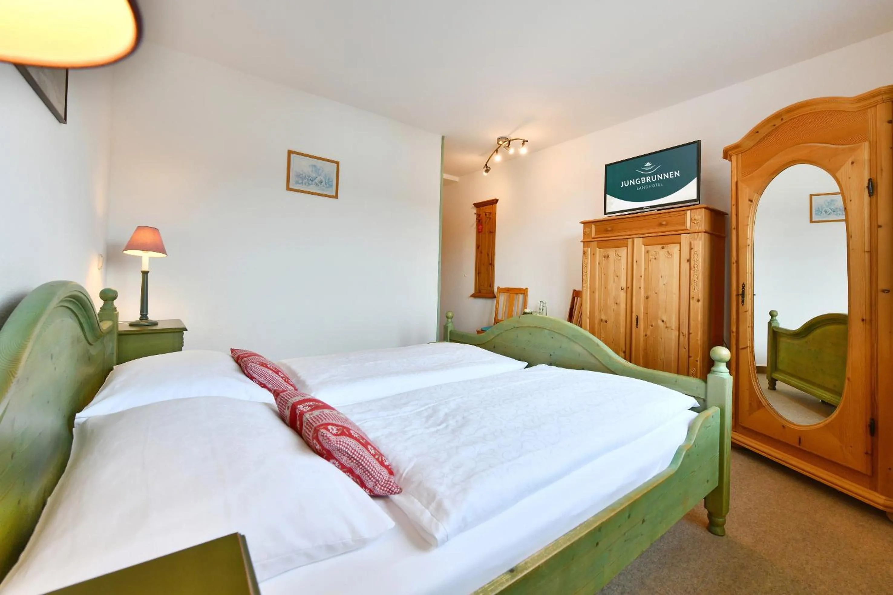 Photo of the whole room, Bed in Landhotel Jungbrunnen