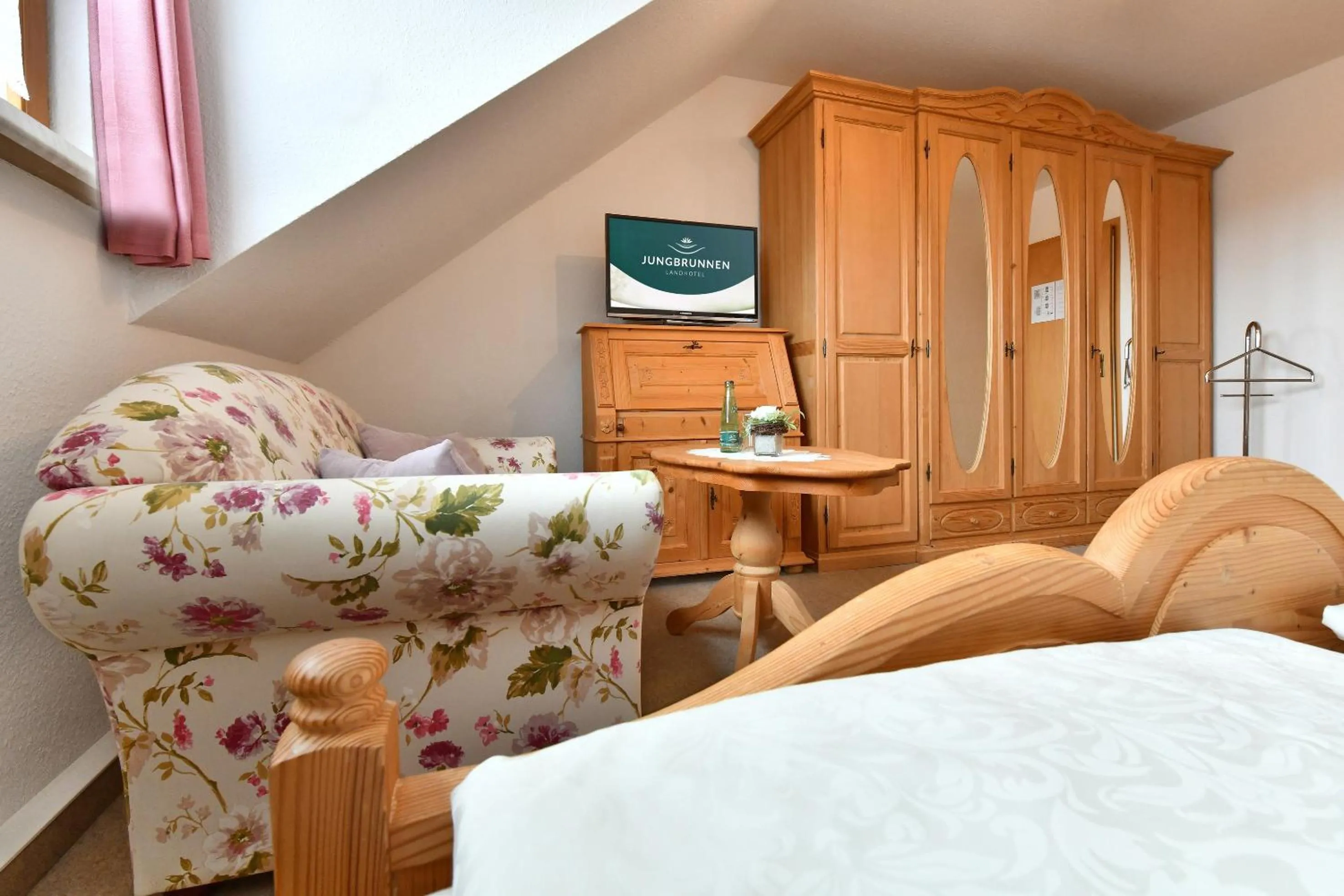 Photo of the whole room, Bed in Landhotel Jungbrunnen