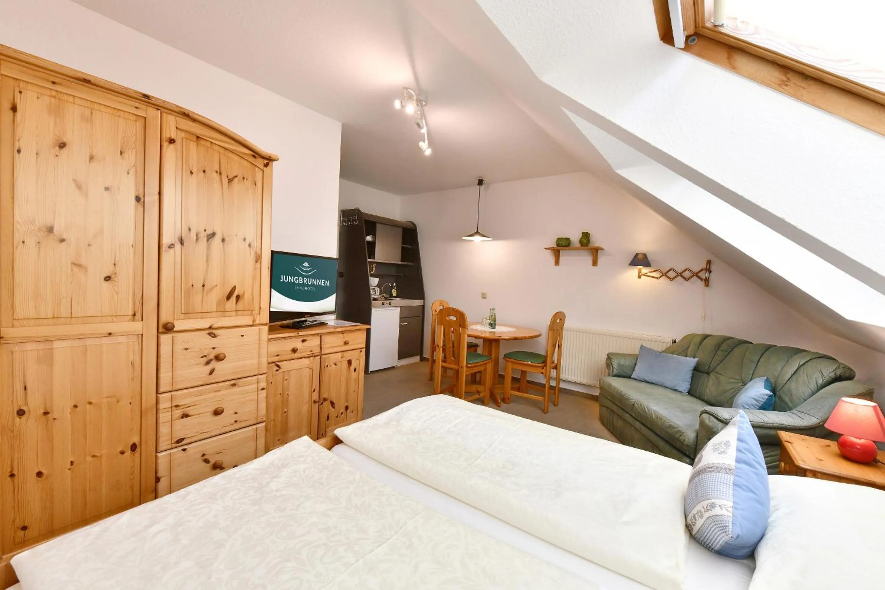 Photo of the whole room, Bed in Landhotel Jungbrunnen
