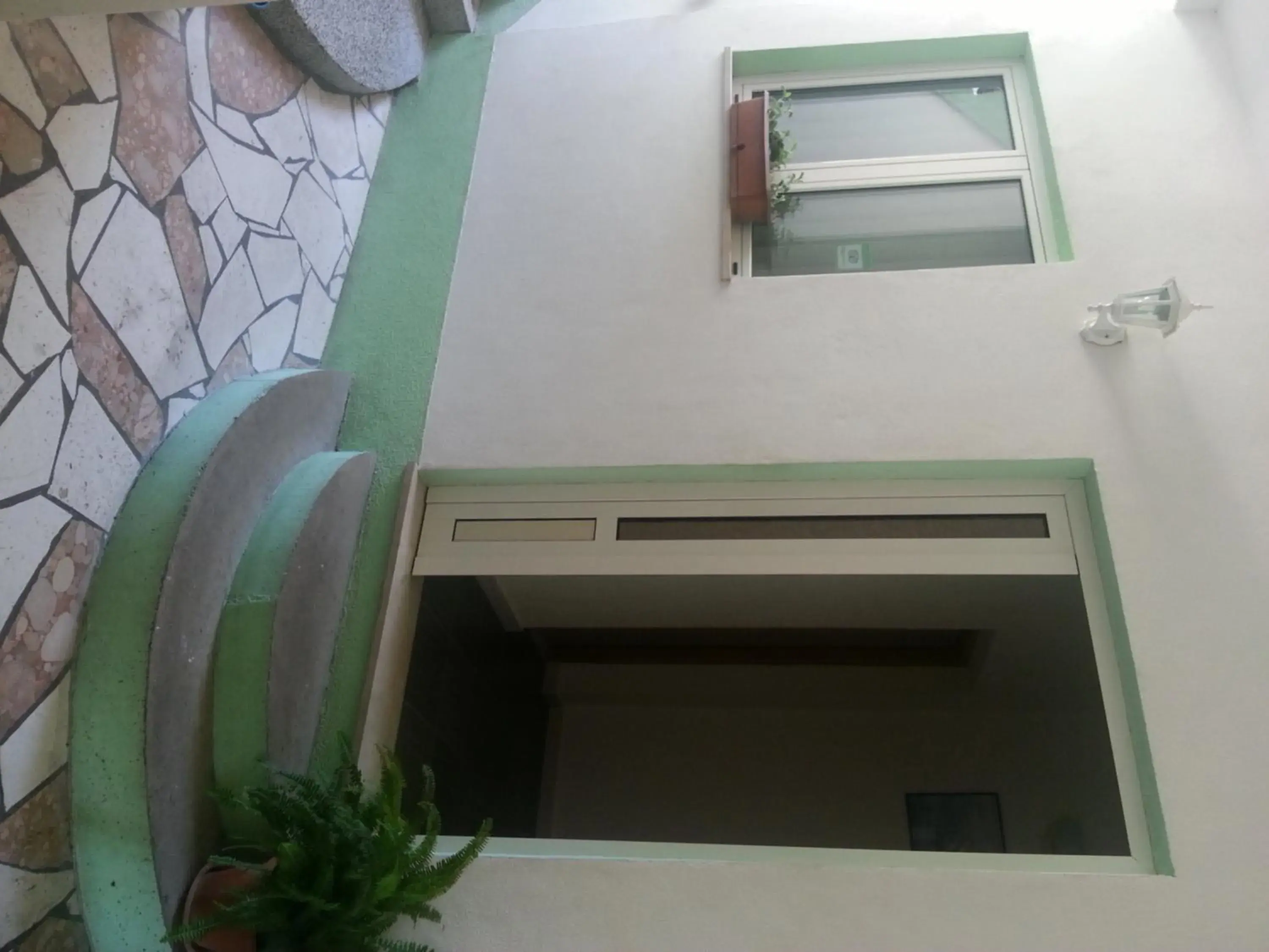 Facade/entrance in Vila Angela Facade/entrance in Vila Angela